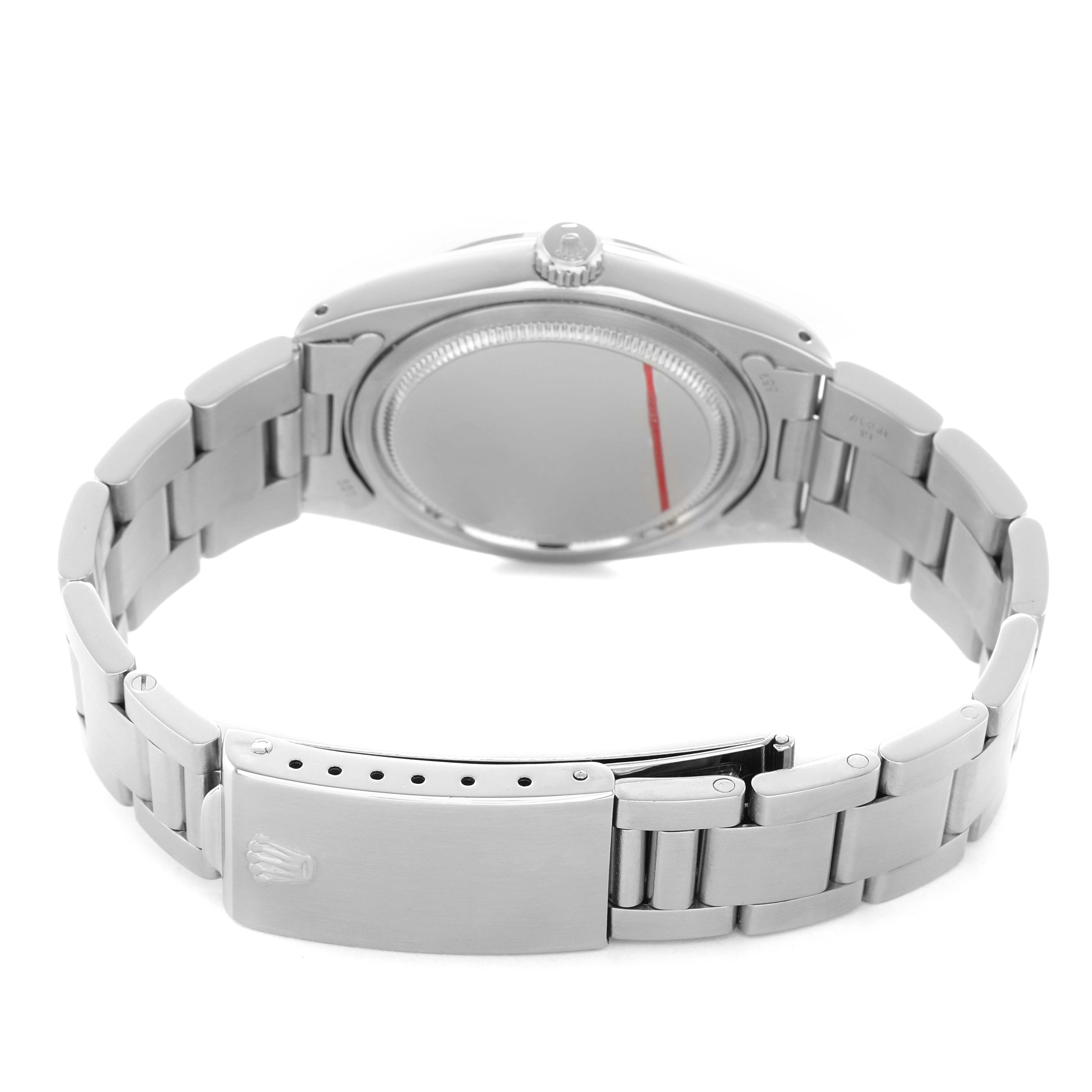 The image shows the back and bracelet of a Rolex Vintage Collection 6694 Men's Stainless Steel Silver Dial watch from a low angle, highlighting the clasp and case back.