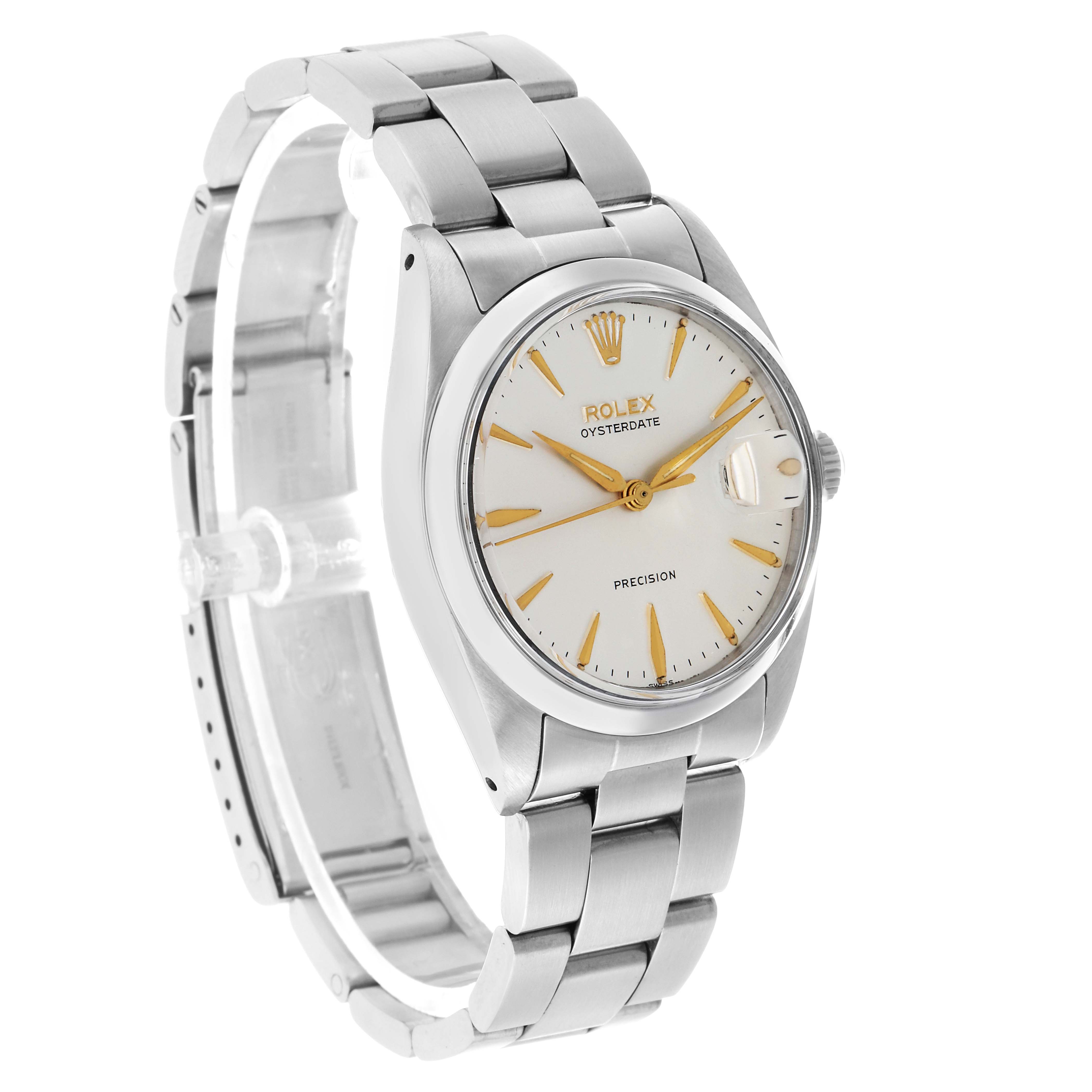 The Rolex Vintage Collection 6694 Men's Stainless Steel Silver Dial watch is shown at a three-quarter angle, highlighting the face, bezel, and bracelet.