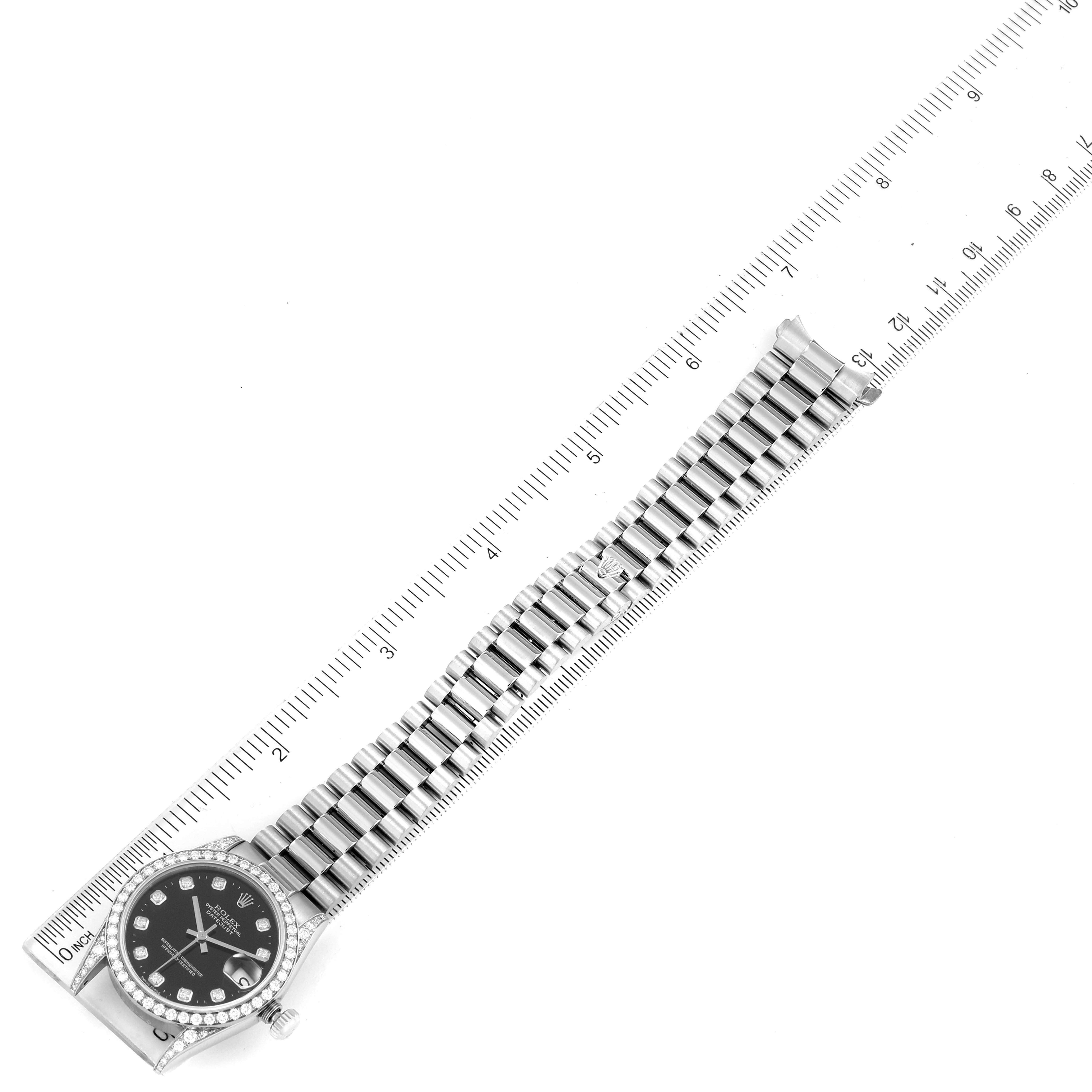 The image shows a top-down view of a Rolex President 68159 Women's White Gold Black Dial 68159 Women's White Gold Black Dial model watch with a ruler for scale.