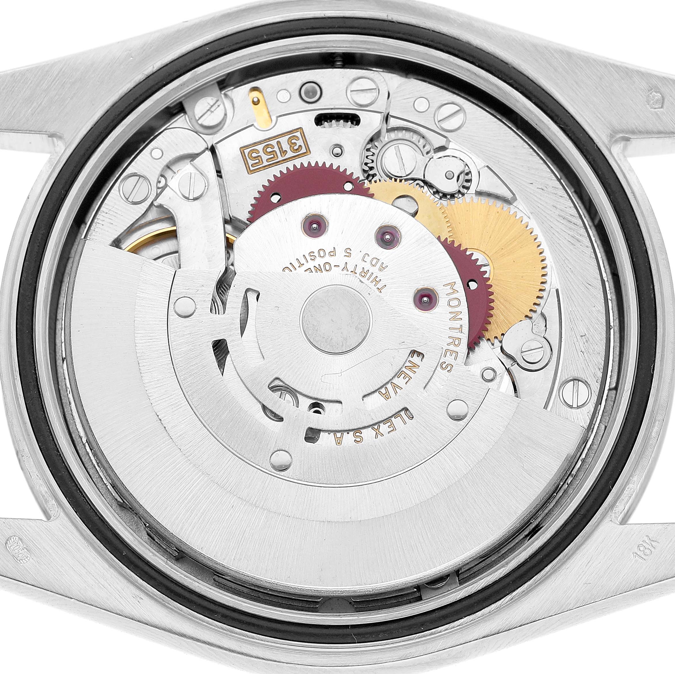The image shows the open case back of a Rolex President 118209 Men's White Gold Silver Dial model, highlighting its intricate mechanical movement.