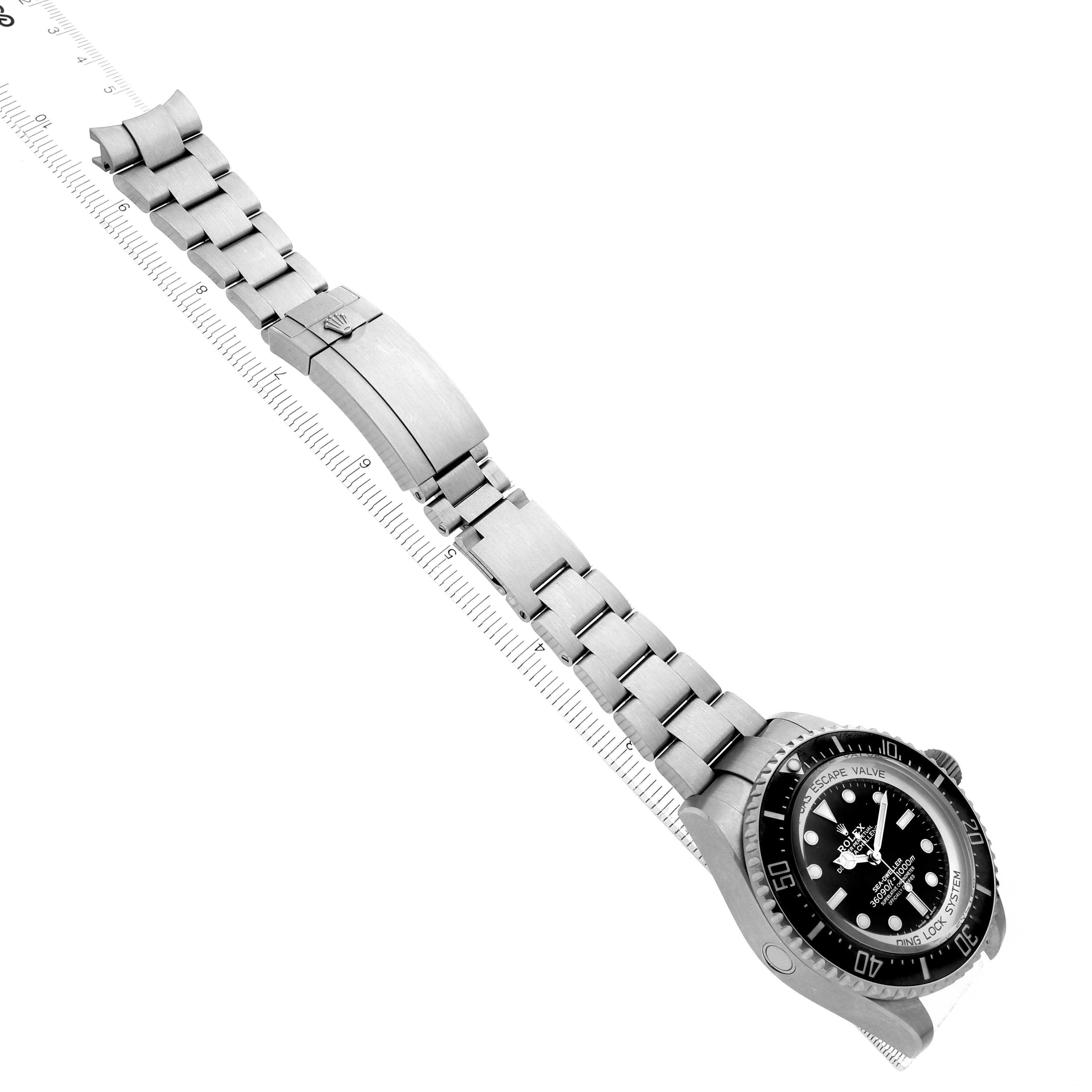 The image shows a side angle of the Rolex Sea-Dweller 126067 Men's Titanium Black Dial watch, highlighting the bracelet and clasp.