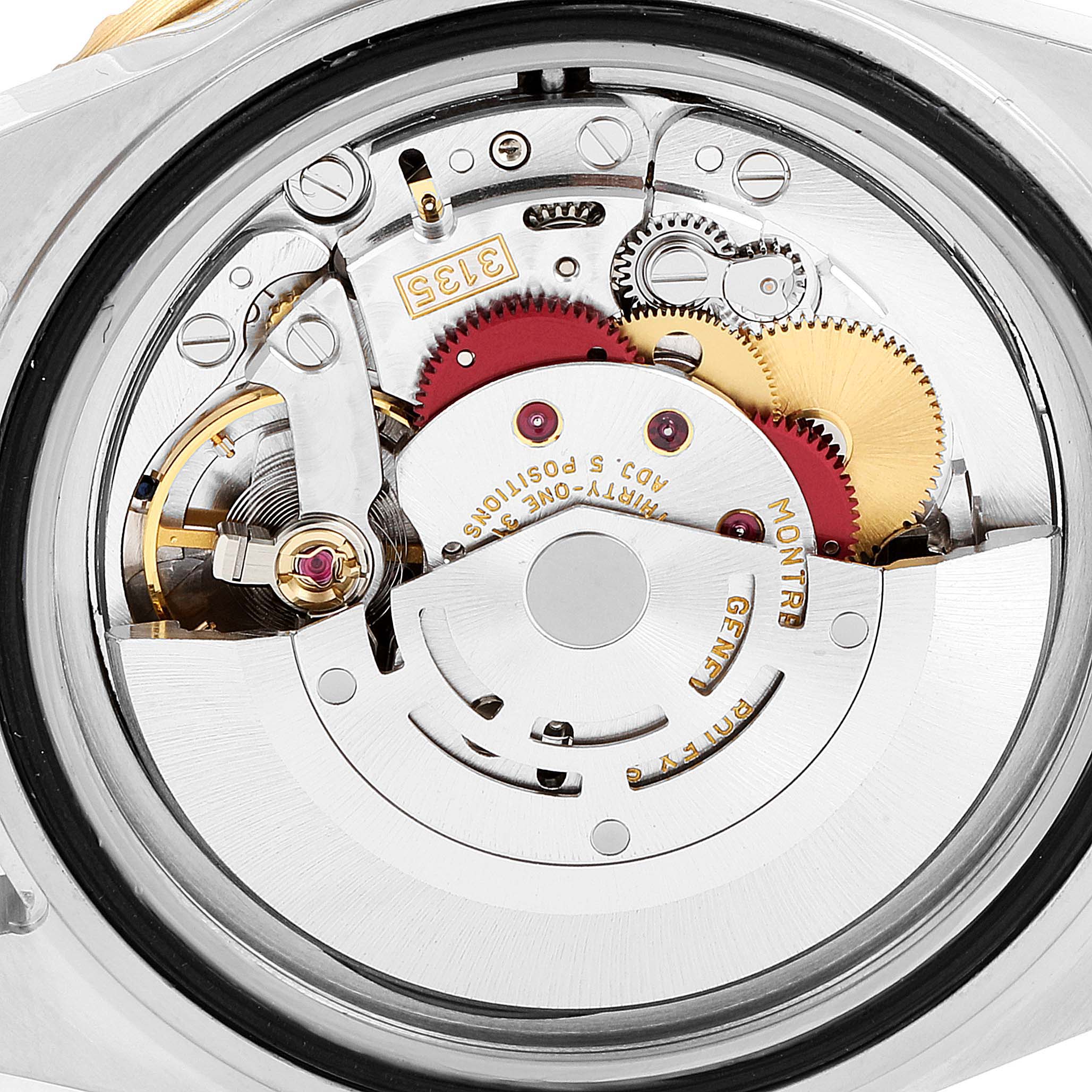 This image shows an internal view of the movement parts of a Rolex Submariner 16613 Men's Steel and Gold (two tone) Blue Dial 16613 Men's Steel and Gold (two tone) Blue Dial watch.