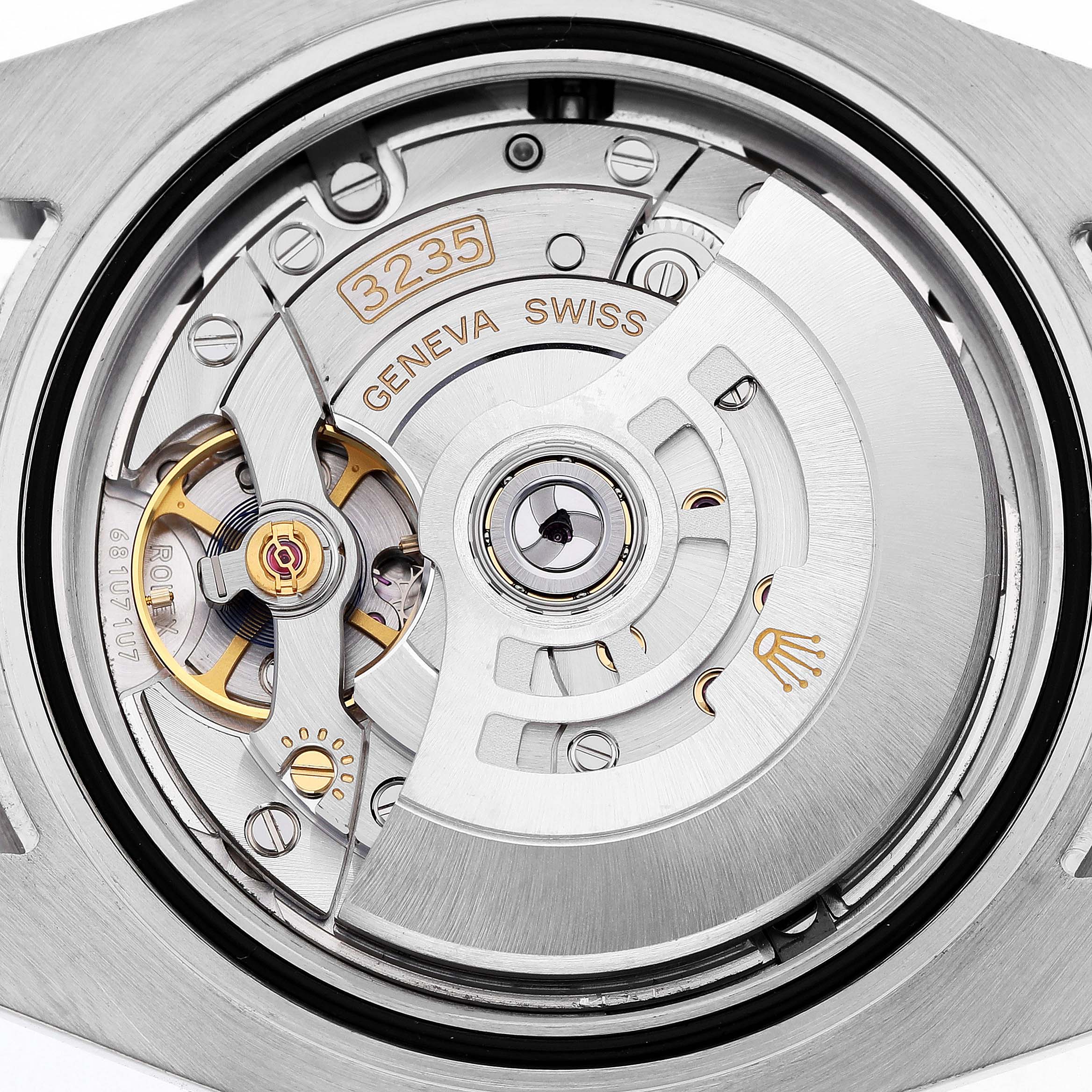 The image shows the movement of a Rolex Submariner 126610LN Men's Stainless Steel Black Dial, specifically the rotor and internal mechanism at an overhead angle.