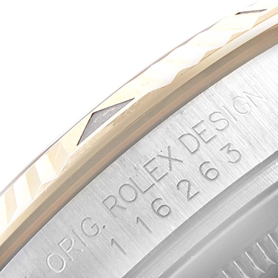 This image shows a close-up of the bezel and the inscribed edge of the Rolex Turn-o-Graph 116263 Men
s Steel and Gold (two tone) White Dial 116263 Men
s Steel and Gold (two tone) White Dial watch, displaying the design details and model number.
