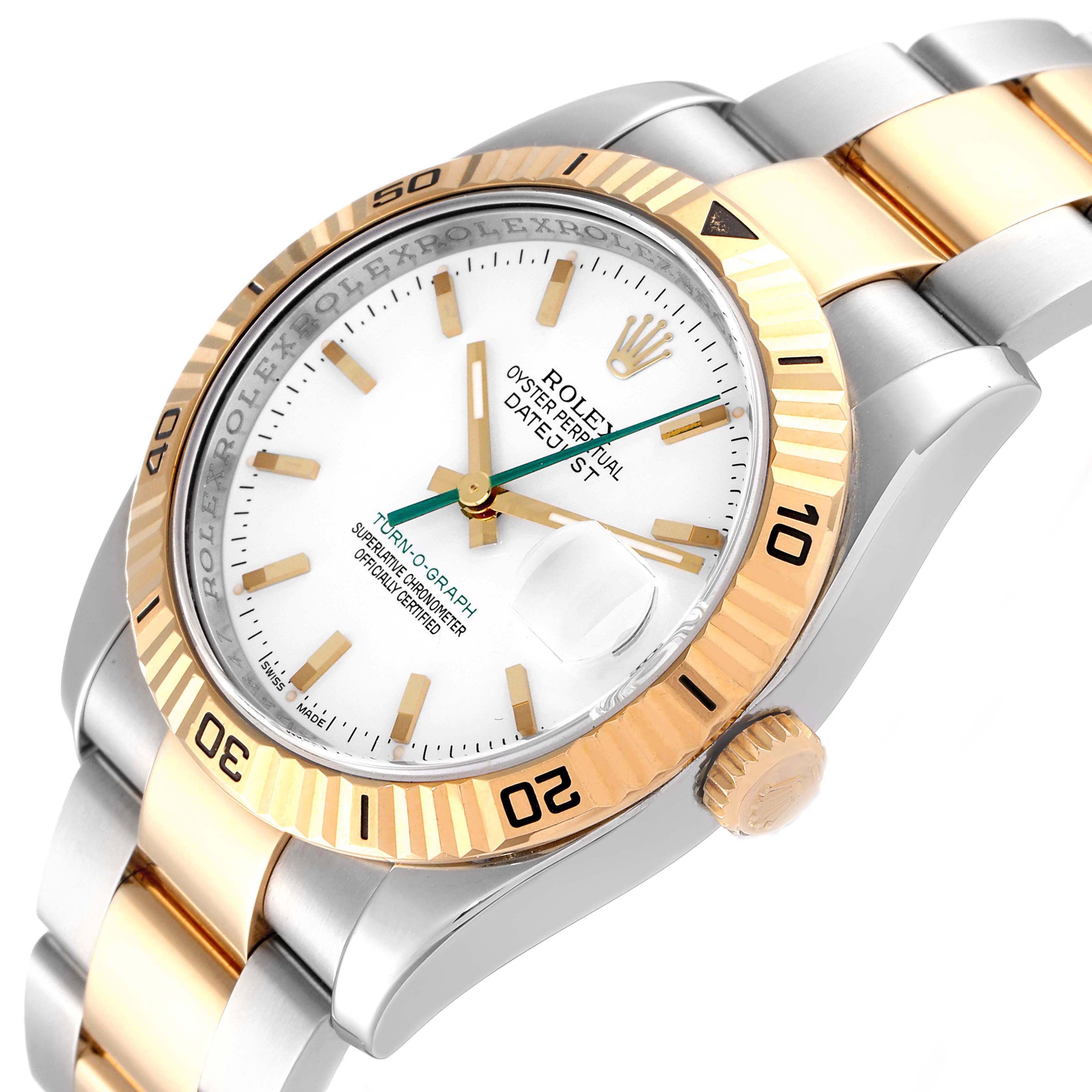 The image shows a Turn-o-Graph Rolex watch at an angled top-down view, displaying the face, bezel, and part of the strap.