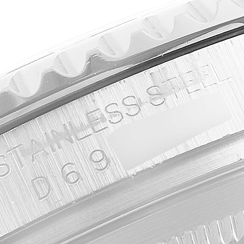 The image shows a close-up of the side case and bezel of the Rolex Yacht-Master 16622 Men's Stainless Steel Silver Dial 16622 Men's Stainless Steel Silver Dial watch, highlighting the stainless steel engraving.