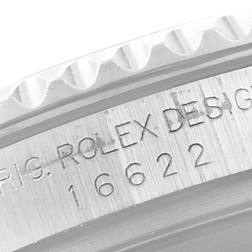 This image shows a close-up of the engraved bezel and case side of the Rolex Yacht-Master 16622 Men's Stainless Steel Silver Dial 16622 Men's Stainless Steel Silver Dial watch, model number 16622.