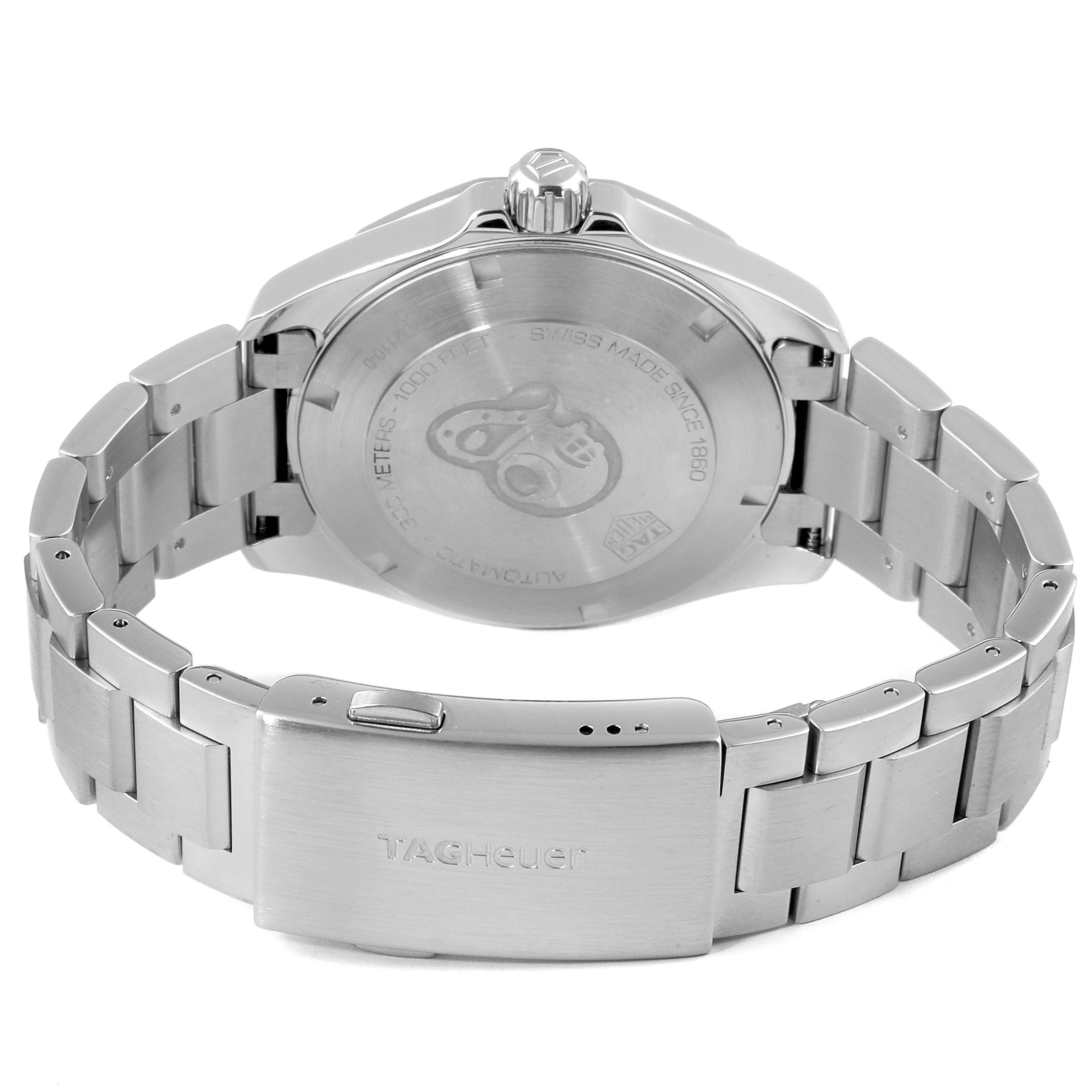 The image shows the back case and metal bracelet of a Tag Heuer Aquaracer WBD2110.BA0928 Men
s Stainless Steel Black Dial WBD2110.BA0928 Men
s Stainless Steel Black Dial watch from an angled rear view.