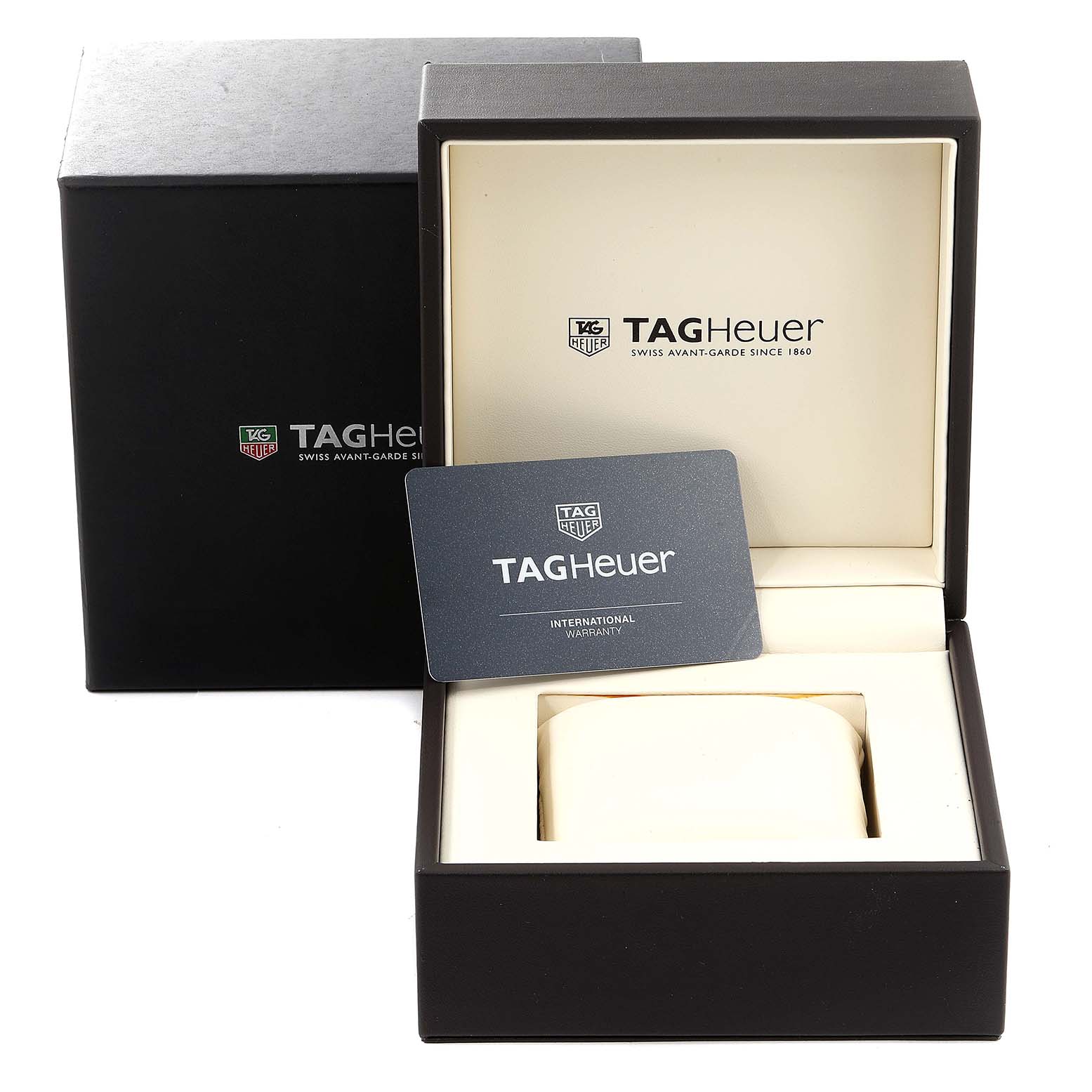 The image shows the box and international warranty card for the Tag Heuer Carrera CAR2B11.BA0799 Men
s Stainless Steel Grey Dial CAR2B11.BA0799 Men
s Stainless Steel Grey Dial watch.