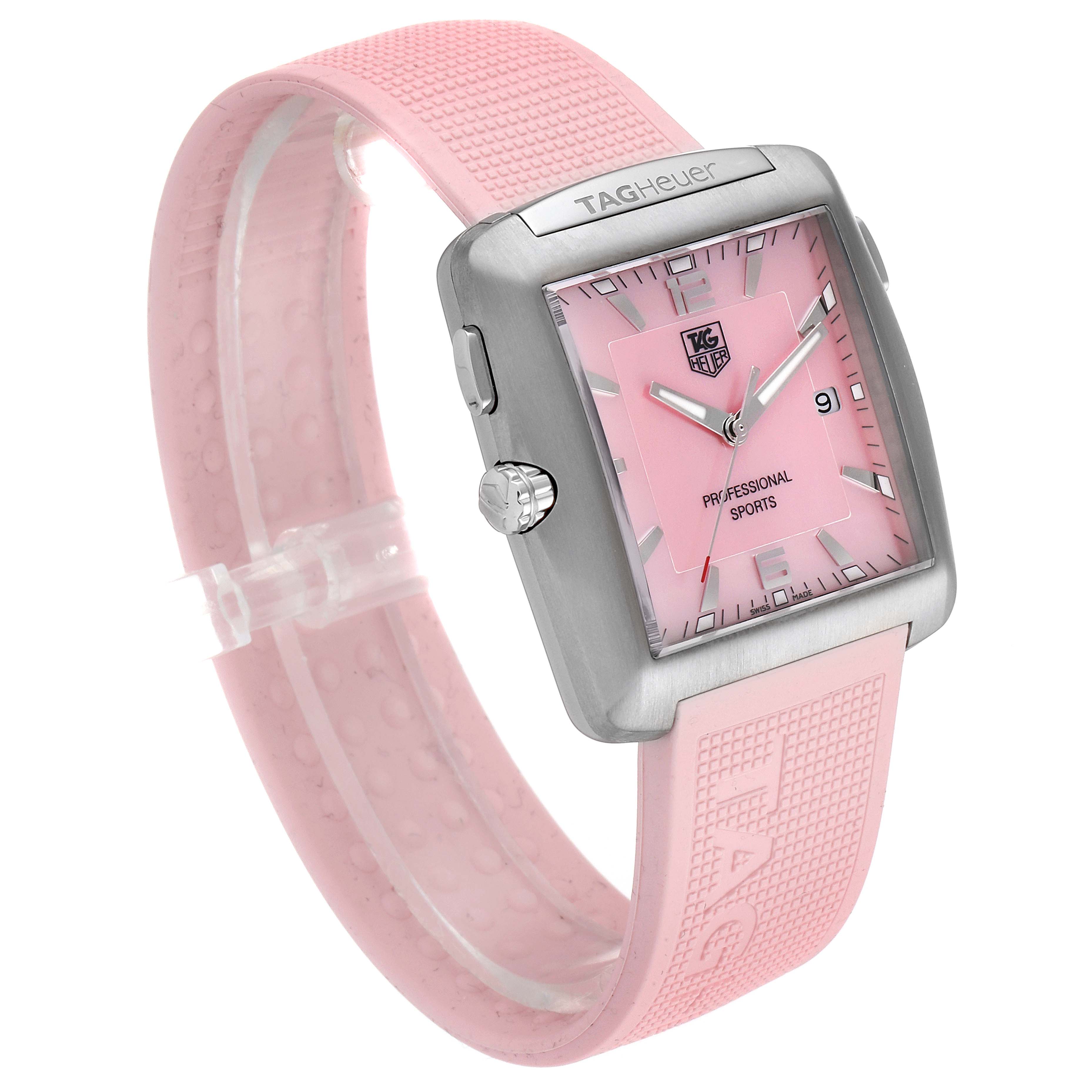 The image shows a Tag Heuer Monaco WAE1114.FT6011 Women's Titanium Mother of Pearl Dial WAE1114.FT6011 Women's Titanium Mother of Pearl Dial watch from a front-left angle, highlighting its pink dial and strap.