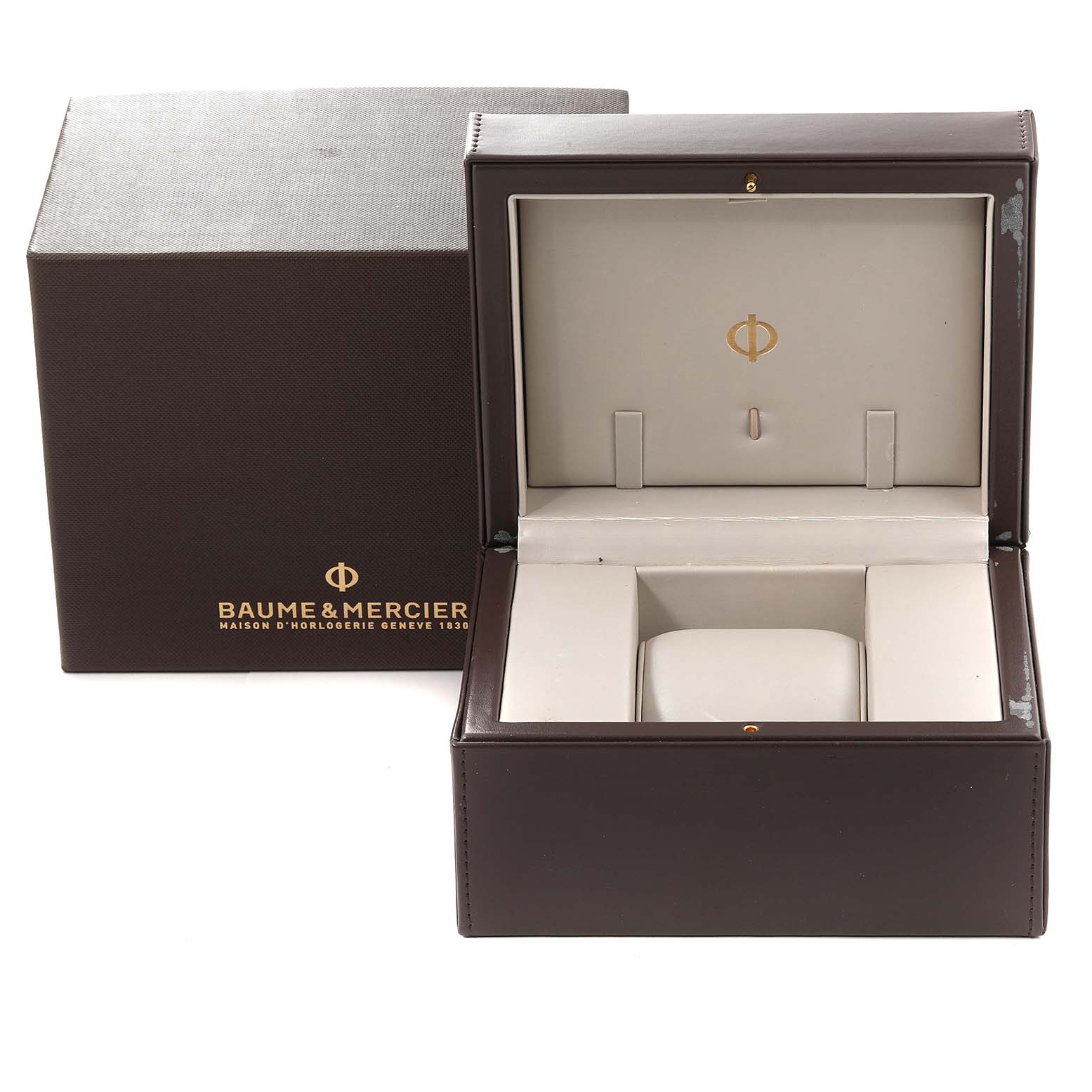 This image shows the packaging box for a Baume & Mercier Capeland M0A10107 Men's Rose Gold Silver Dial M0A10107 Men's Rose Gold Silver Dial watch, including the outer box and the inner presentation box.