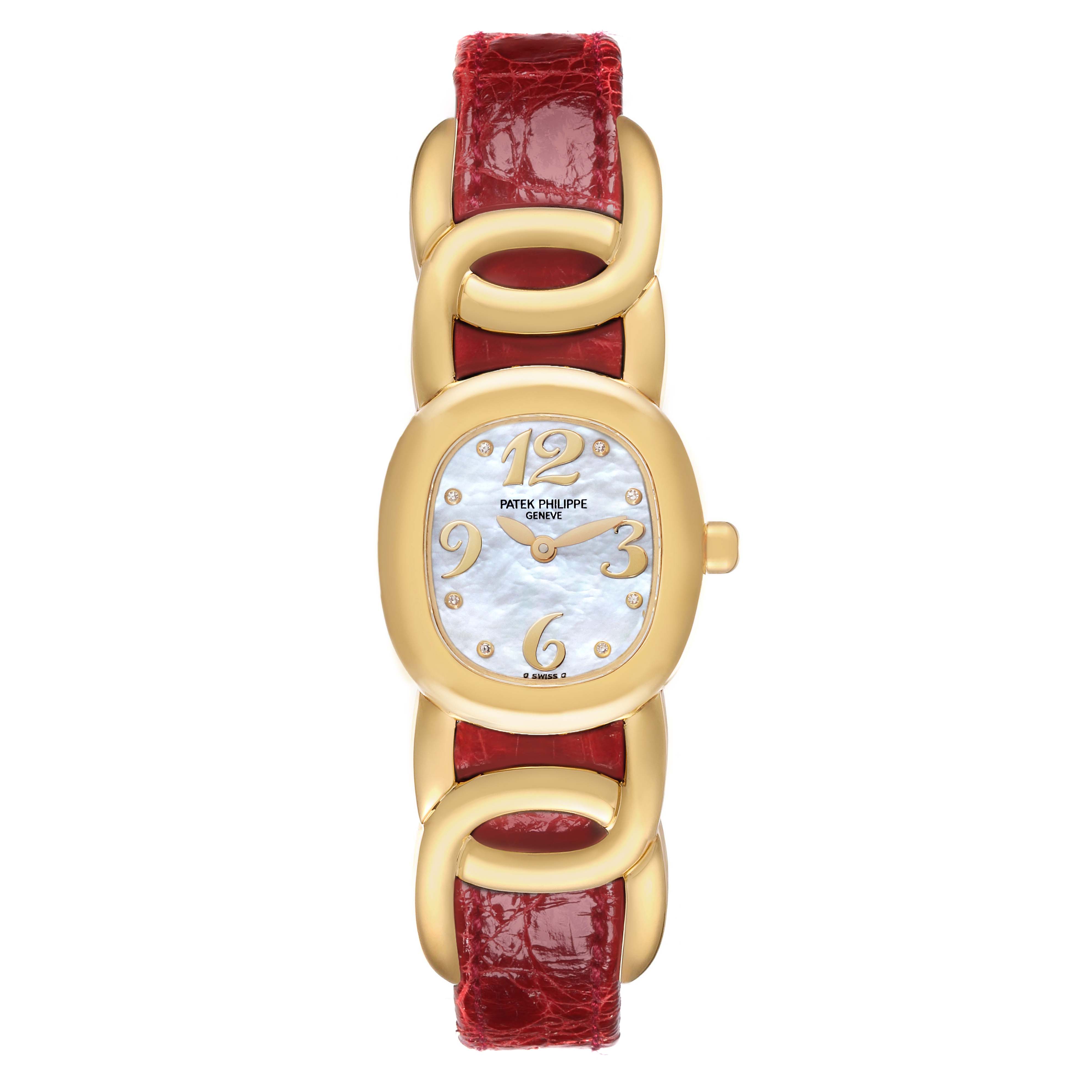 The Patek Philippe Golden Ellipse 4830J Women's Yellow Gold Mother of Pearl Dial 4830J Women's Yellow Gold Mother of Pearl Dial watch is shown from a top view, featuring the face, gold bezel, and red leather strap.