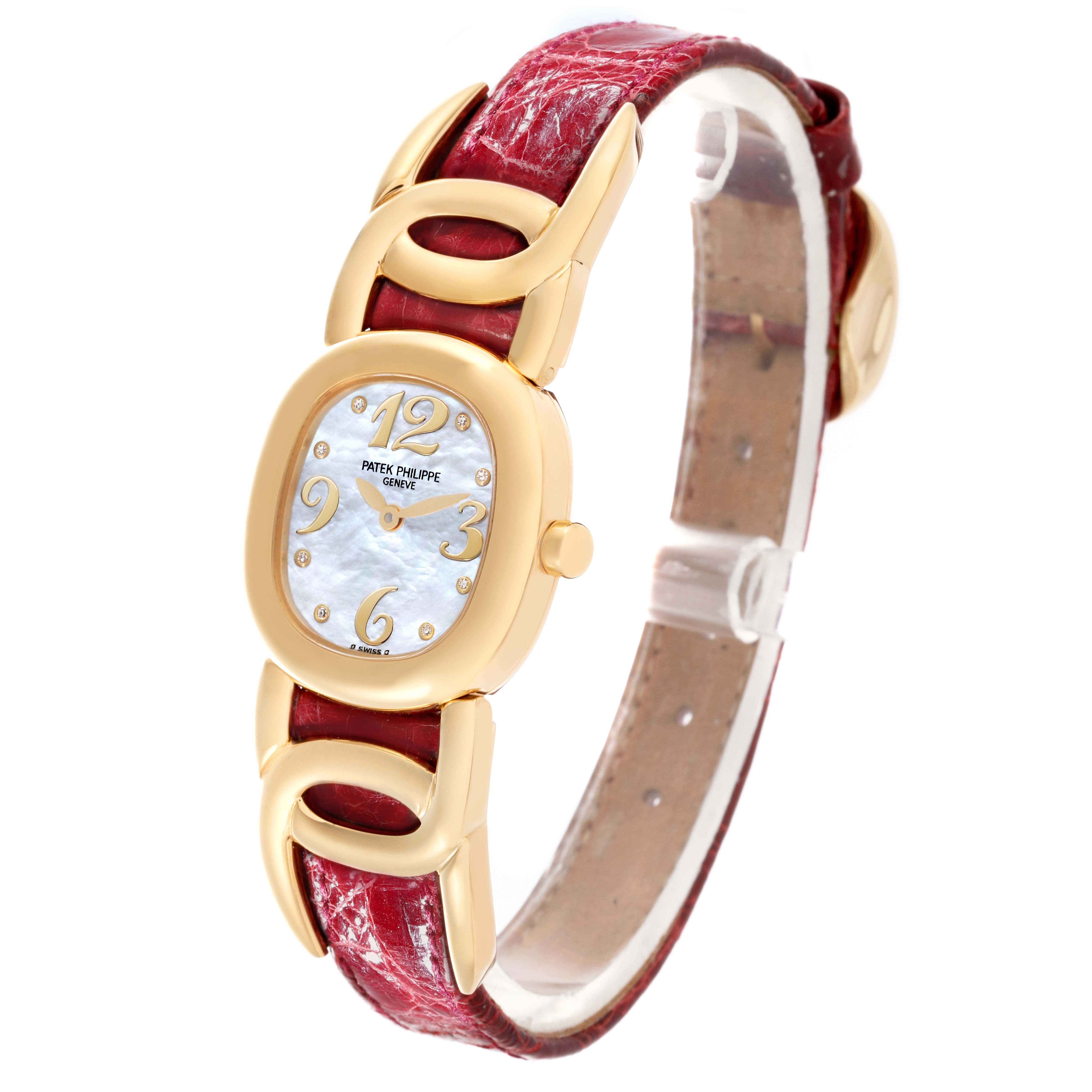 The Patek Philippe Golden Ellipse 4830J Women's Yellow Gold Mother of Pearl Dial 4830J Women's Yellow Gold Mother of Pearl Dial is shown at a three-quarter angle, displaying the face, strap, and gold accents prominently.