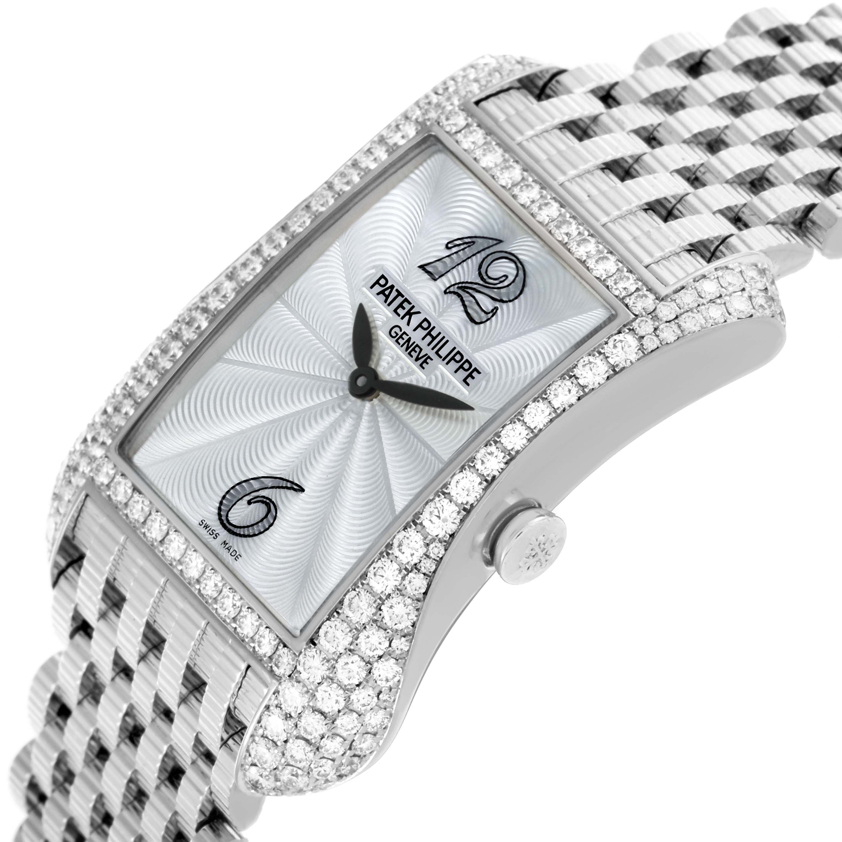 The image shows a close-up side angle of the Patek Philippe Gondolo 4972/1G-001 Women's White Gold Mother of Pearl Dial 4972/1G-001 Women's White Gold Mother of Pearl Dial watch, highlighting its dial, case, crown, and bracelet.