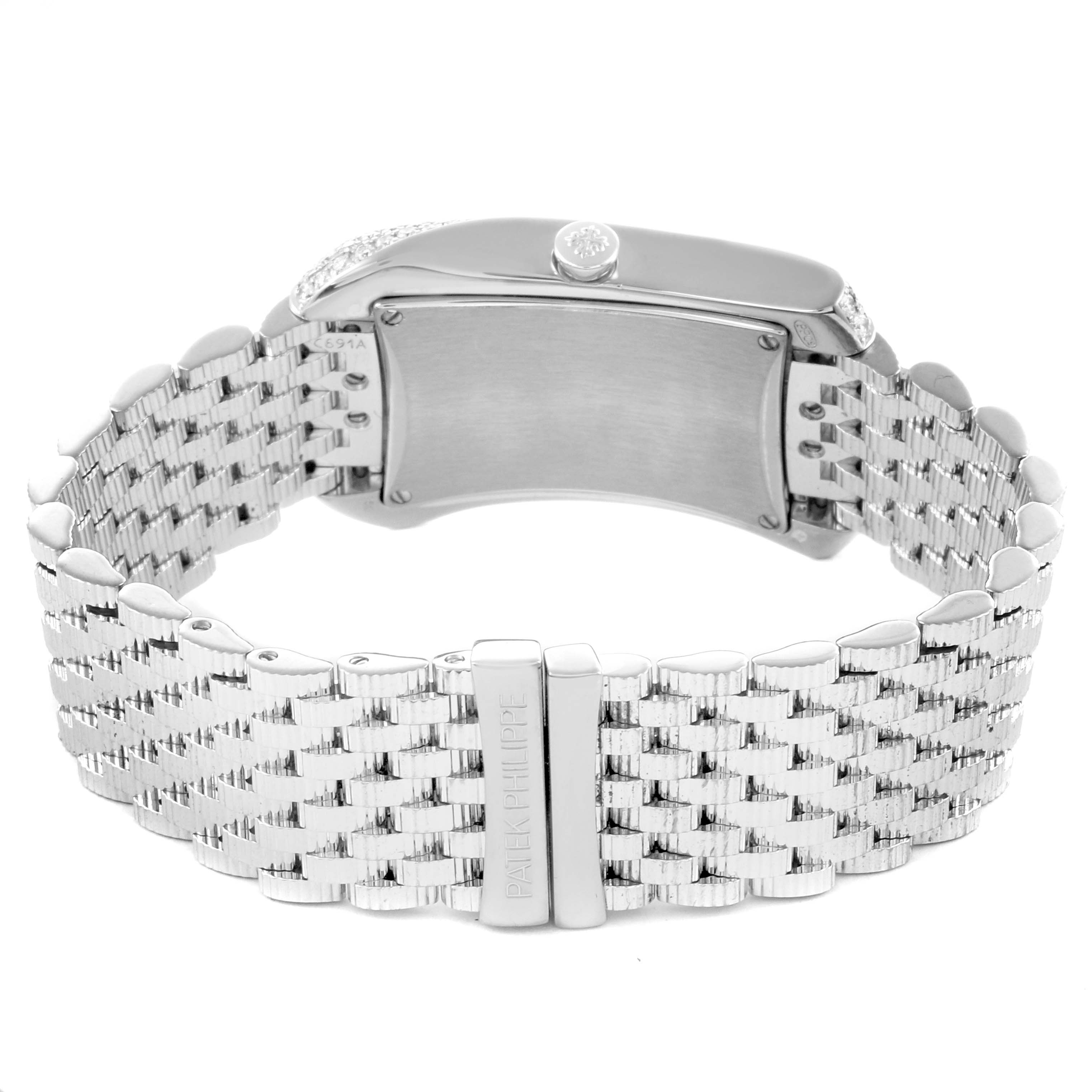 The image shows the back and side profile of a Patek Philippe Gondolo 4972/1G-001 Women's White Gold Mother of Pearl Dial 4972/1G-001 Women's White Gold Mother of Pearl Dial watch with a metal bracelet.