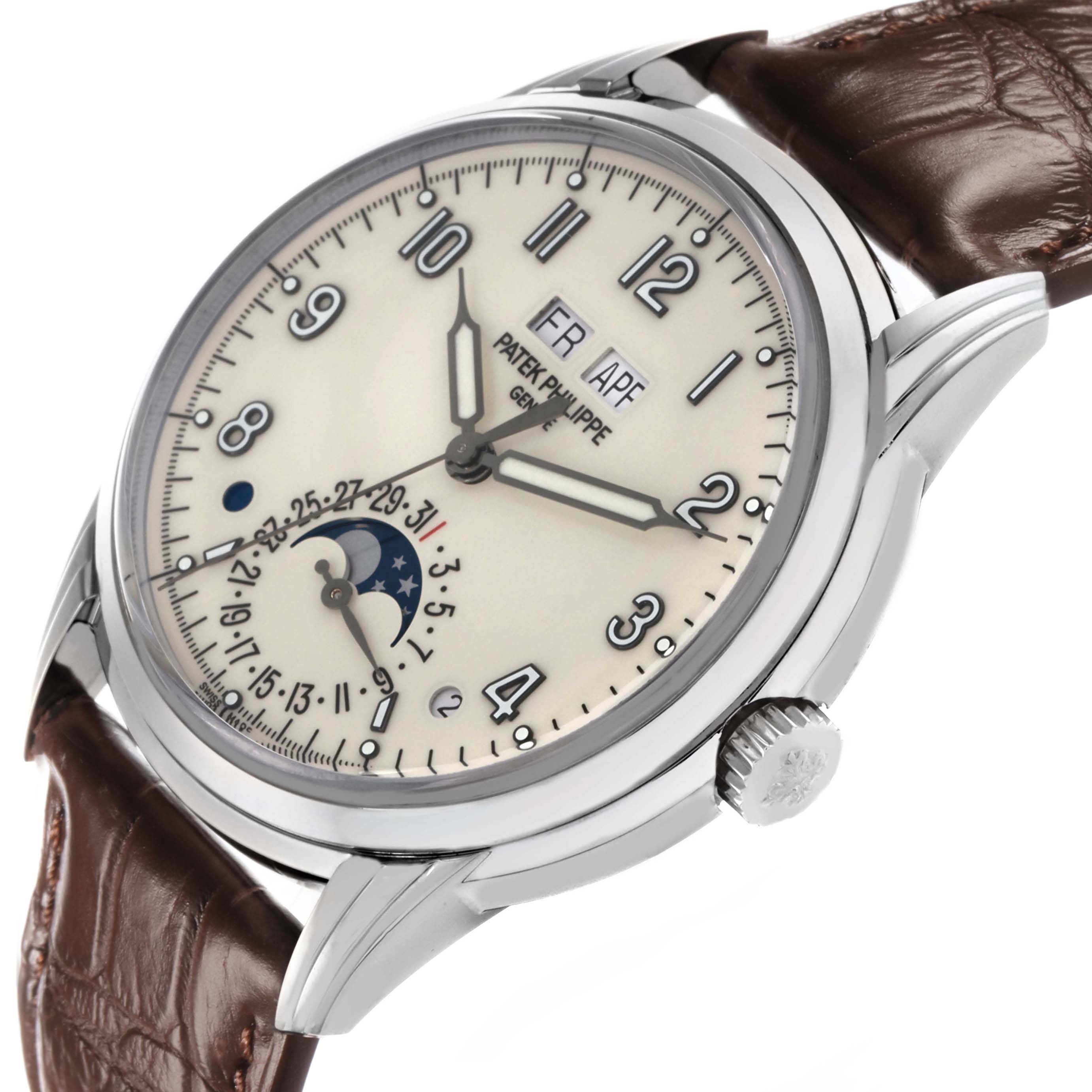 The Patek Philippe Complications 5320G Men's White Gold White Dial watch is angled to show the dial, crown, and brown leather strap clearly.