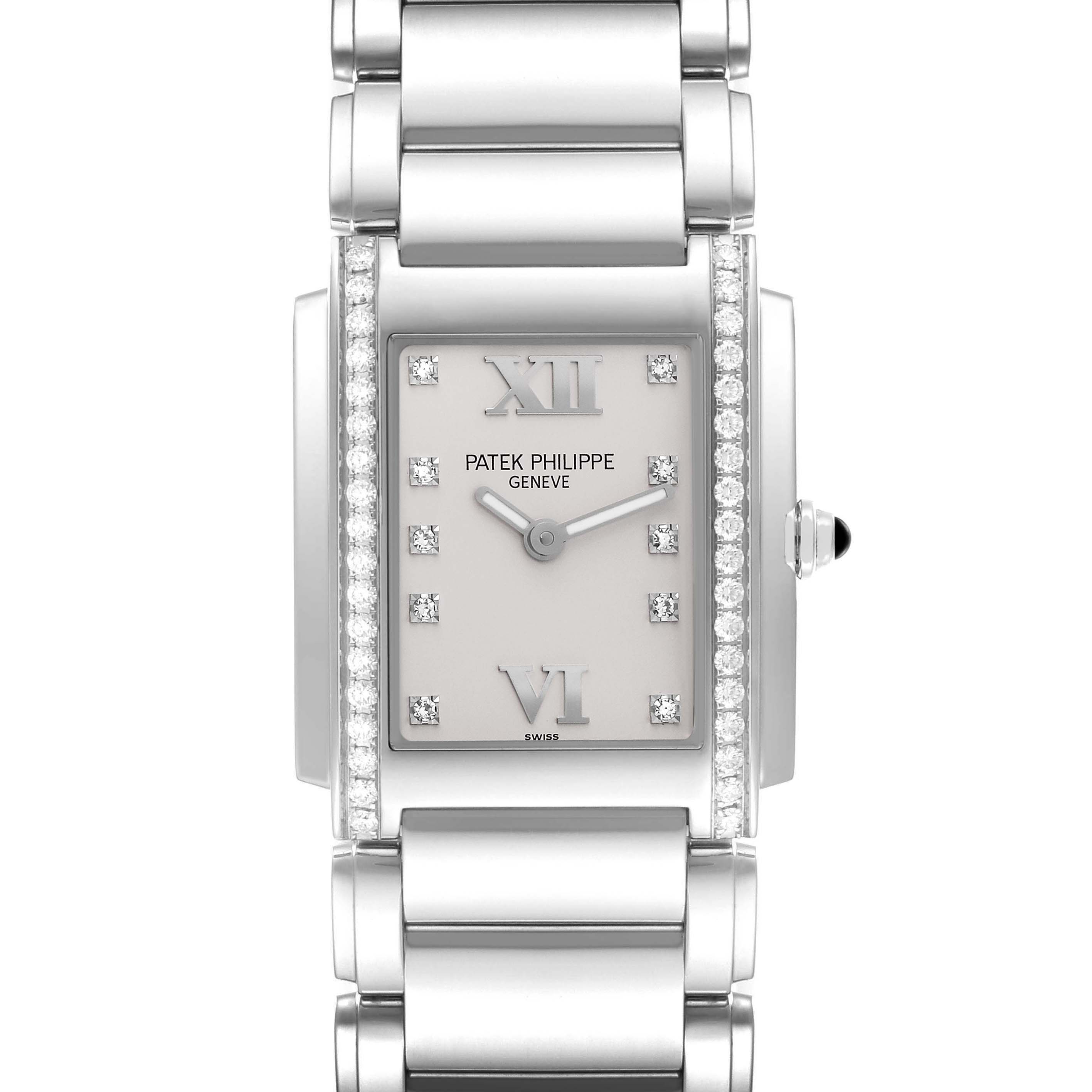 The image shows a frontal view of the Patek Philippe Twenty-4 4910/10A-011 Women's Stainless Steel Silver Dial 4910/10A-011 Women's Stainless Steel Silver Dial watch, highlighting its face, bracelet, and diamond accents.