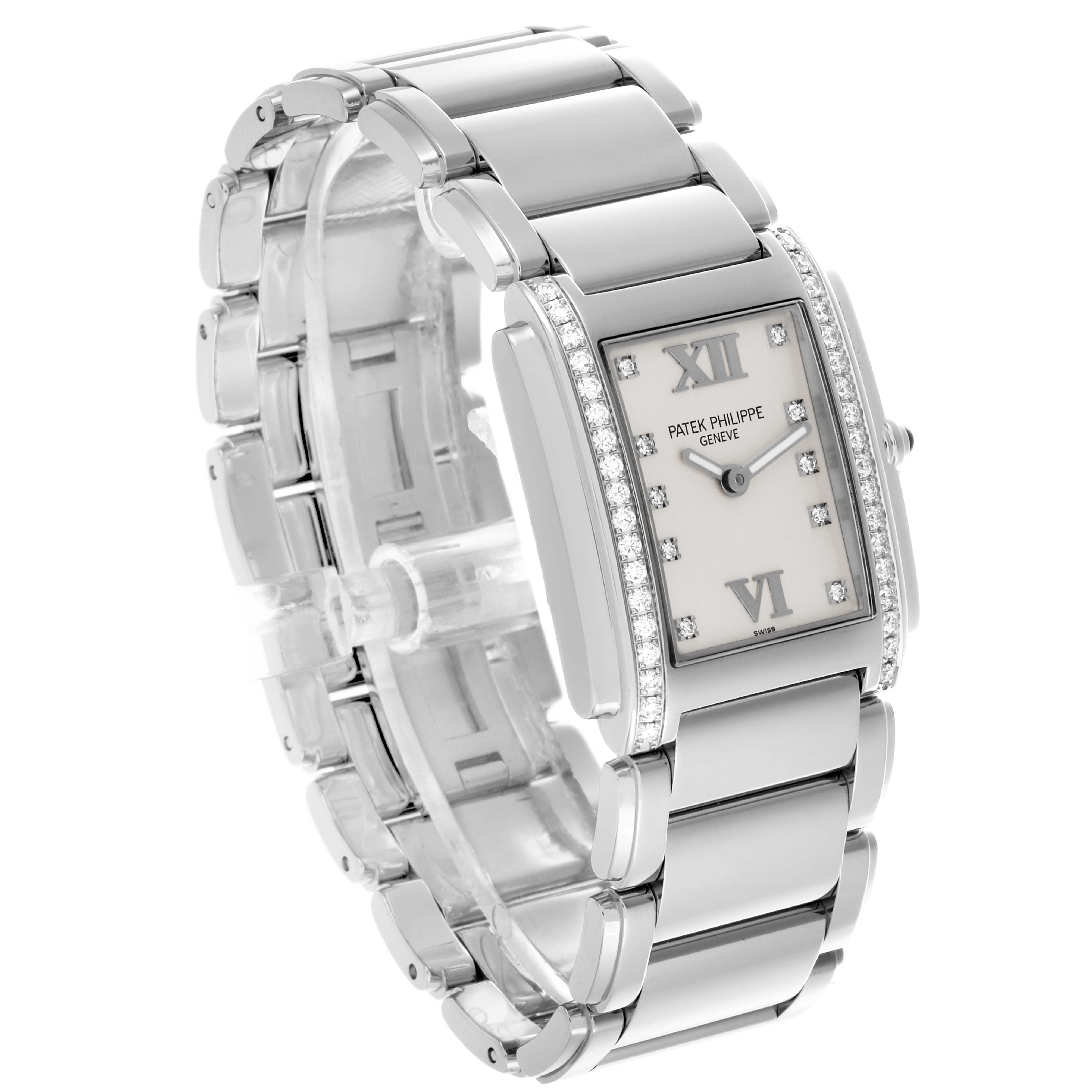 The image shows a side angle of the Patek Philippe Twenty-4 4910/10A-011 Women's Stainless Steel Silver Dial 4910/10A-011 Women's Stainless Steel Silver Dial watch, highlighting its metal bracelet and diamond-set rectangular dial.