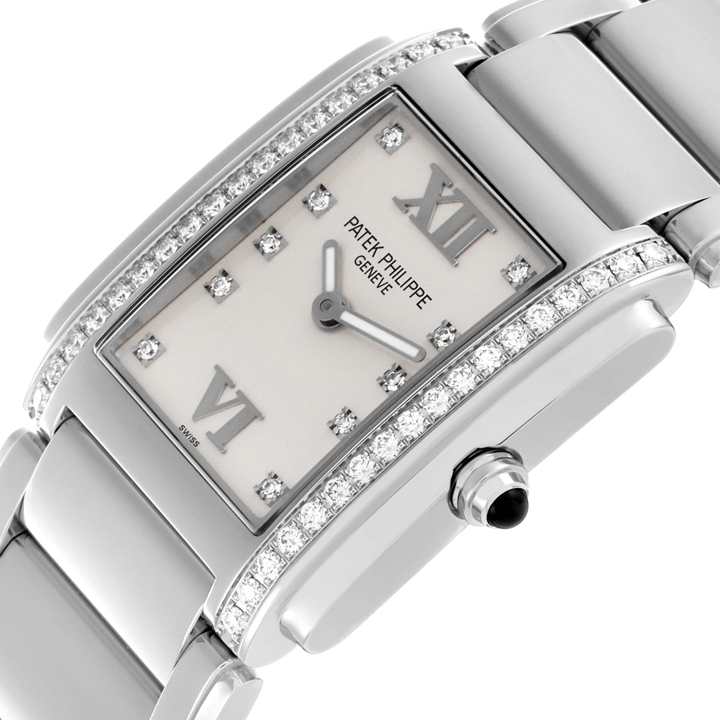 The Patek Philippe Twenty-4 4910/10A-011 Women's Stainless Steel Silver Dial 4910/10A-011 Women's Stainless Steel Silver Dial watch is shown at an angled close-up, highlighting its diamond bezel, dial, and crown.