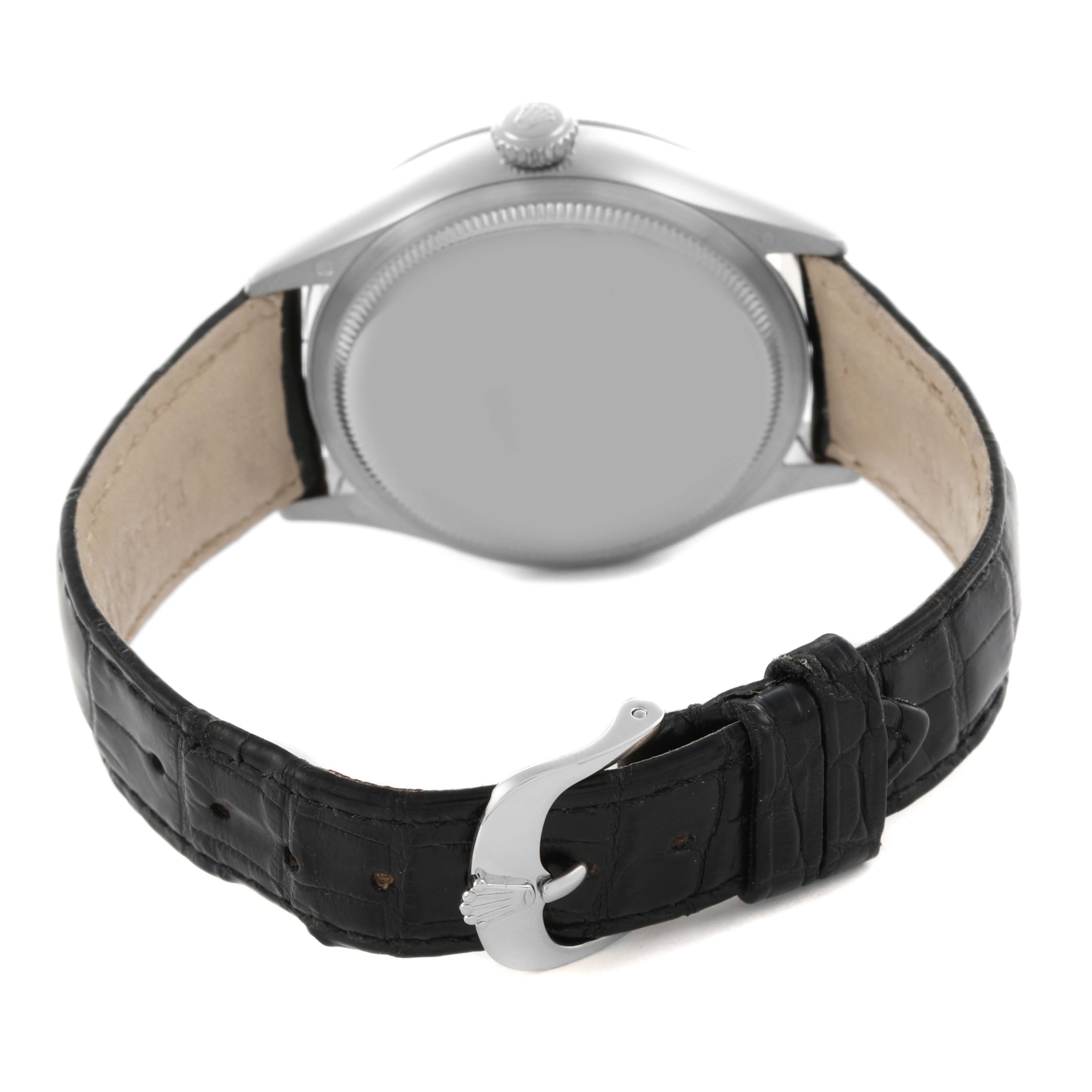 The image shows the back of a Rolex Cellini 50519 Men
s White Gold Silver Dial 50519 Men
s White Gold Silver Dial watch, highlighting the case, crown, and leather strap.