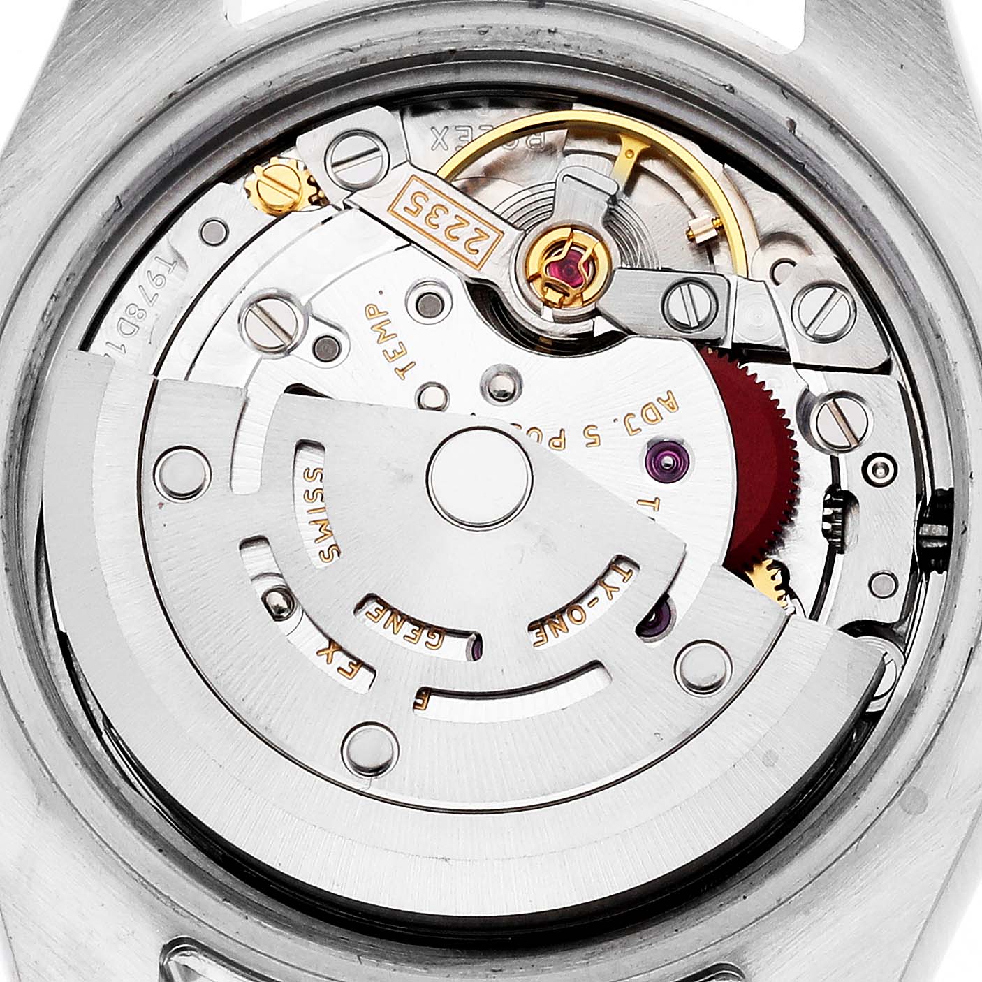 The image shows the movement mechanism of a Rolex Datejust 179173 Women's Steel and Gold (two tone) Silver Dial 179173 Women's Steel and Gold (two tone) Silver Dial watch from a top view, revealing gears and components.