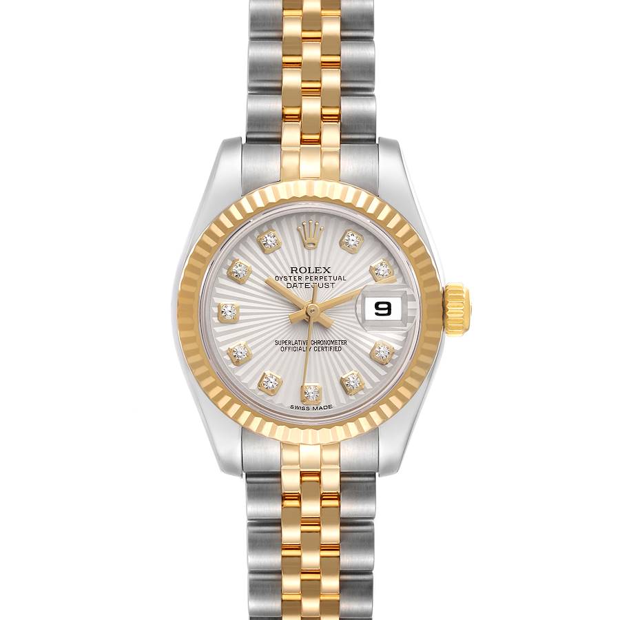 The Rolex Datejust is shown from a top-down angle, highlighting its two-tone bracelet, dial, date window, and fluted bezel.