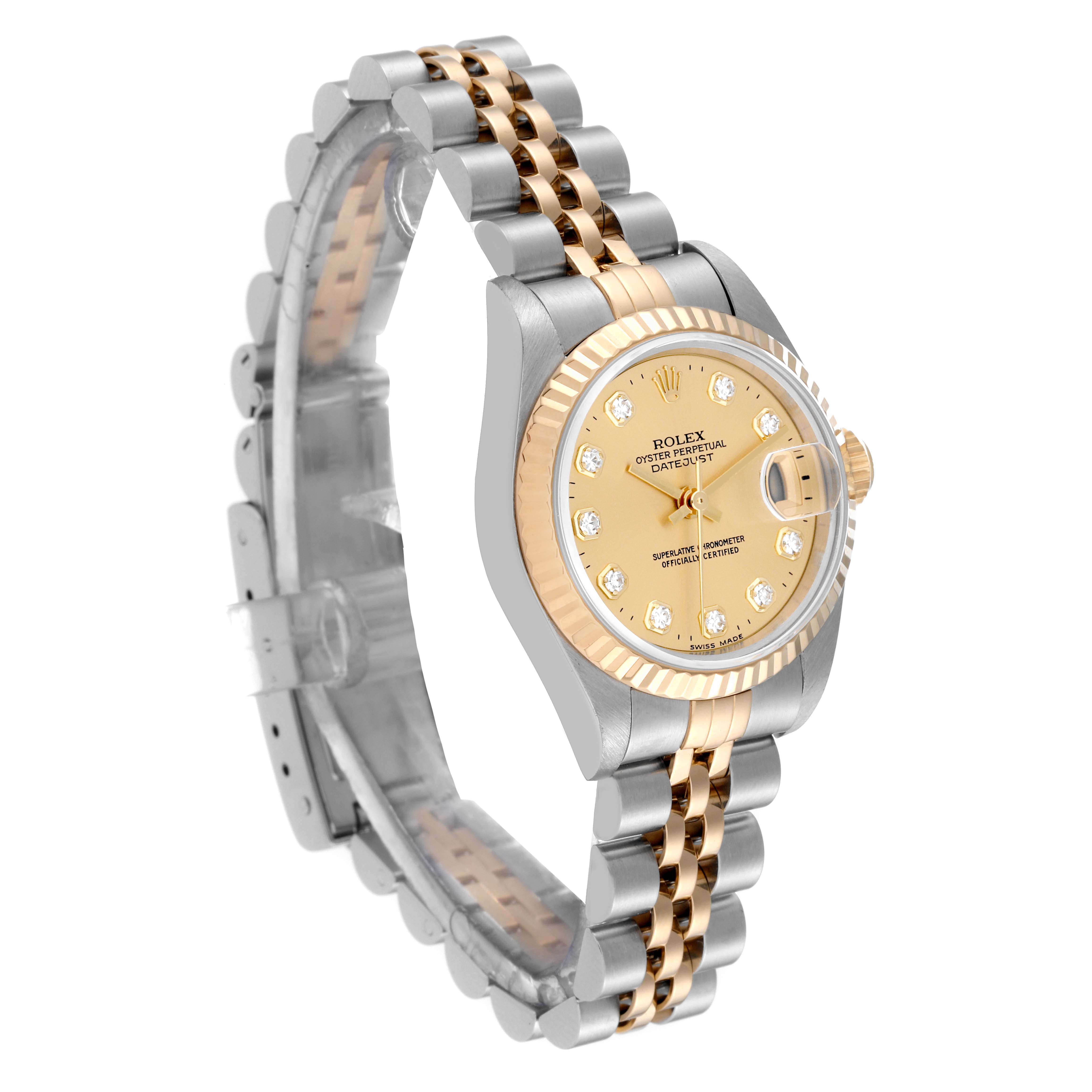 This image shows a Rolex Datejust 69173 Women's Steel and Gold (two tone) Champagne Dial 69173 Women's Steel and Gold (two tone) Champagne Dial watch from a side angle, featuring the dial, bezel, crown, and bracelet.