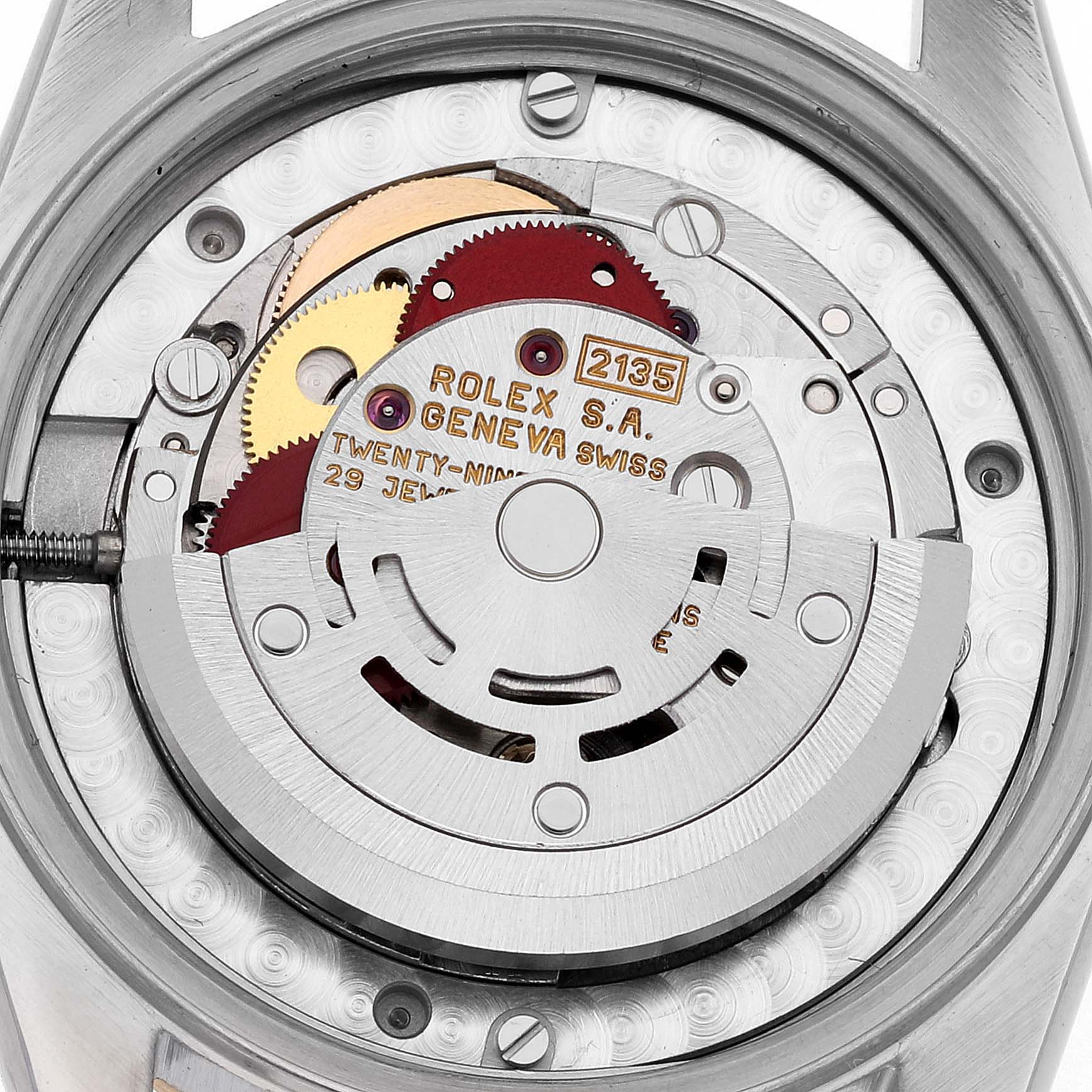 This image shows the exposed movement mechanism of a Rolex Mid-Size 68273 Women
s Steel and Gold (two tone) Black Dial 68273 Women
s Steel and Gold (two tone) Black Dial watch, model 2135, from a top-down angle.