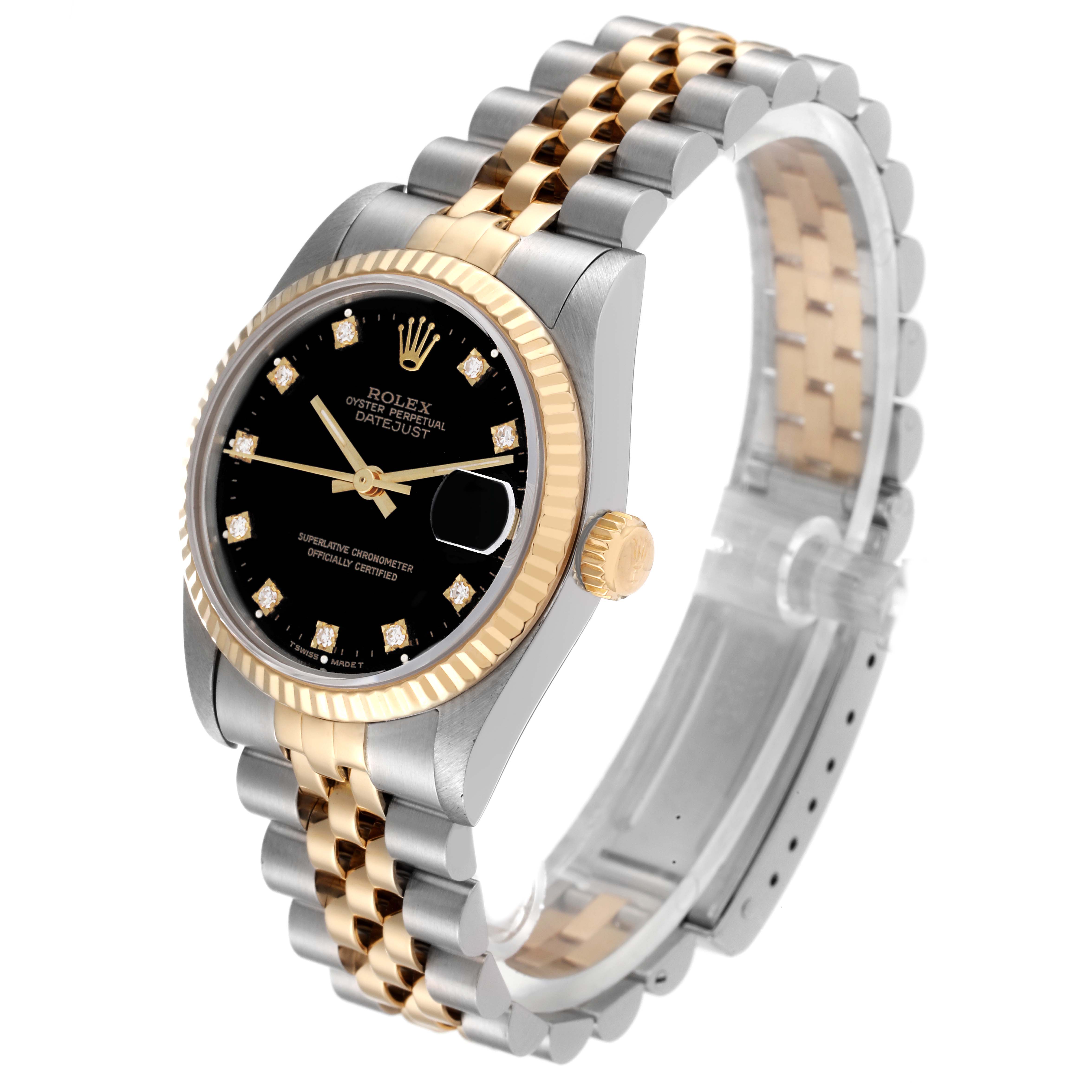 This image shows a side angle view of the Rolex Mid-Size 68273 Women
s Steel and Gold (two tone) Black Dial 68273 Women
s Steel and Gold (two tone) Black Dial Datejust watch, highlighting its bezel, dial, bracelet, and crown.