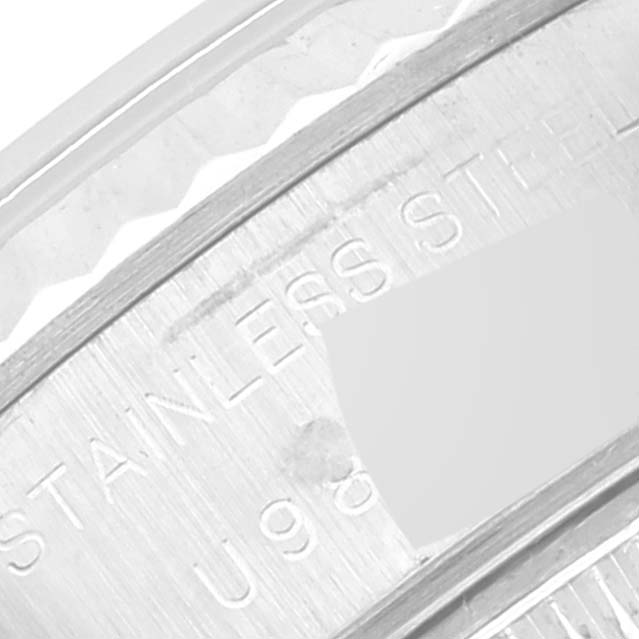 The image shows a close-up of the inner bezel with an engraving on a Rolex Datejust 69174 Women's Stainless Steel Silver Dial 69174 Women's Stainless Steel Silver Dial watch.