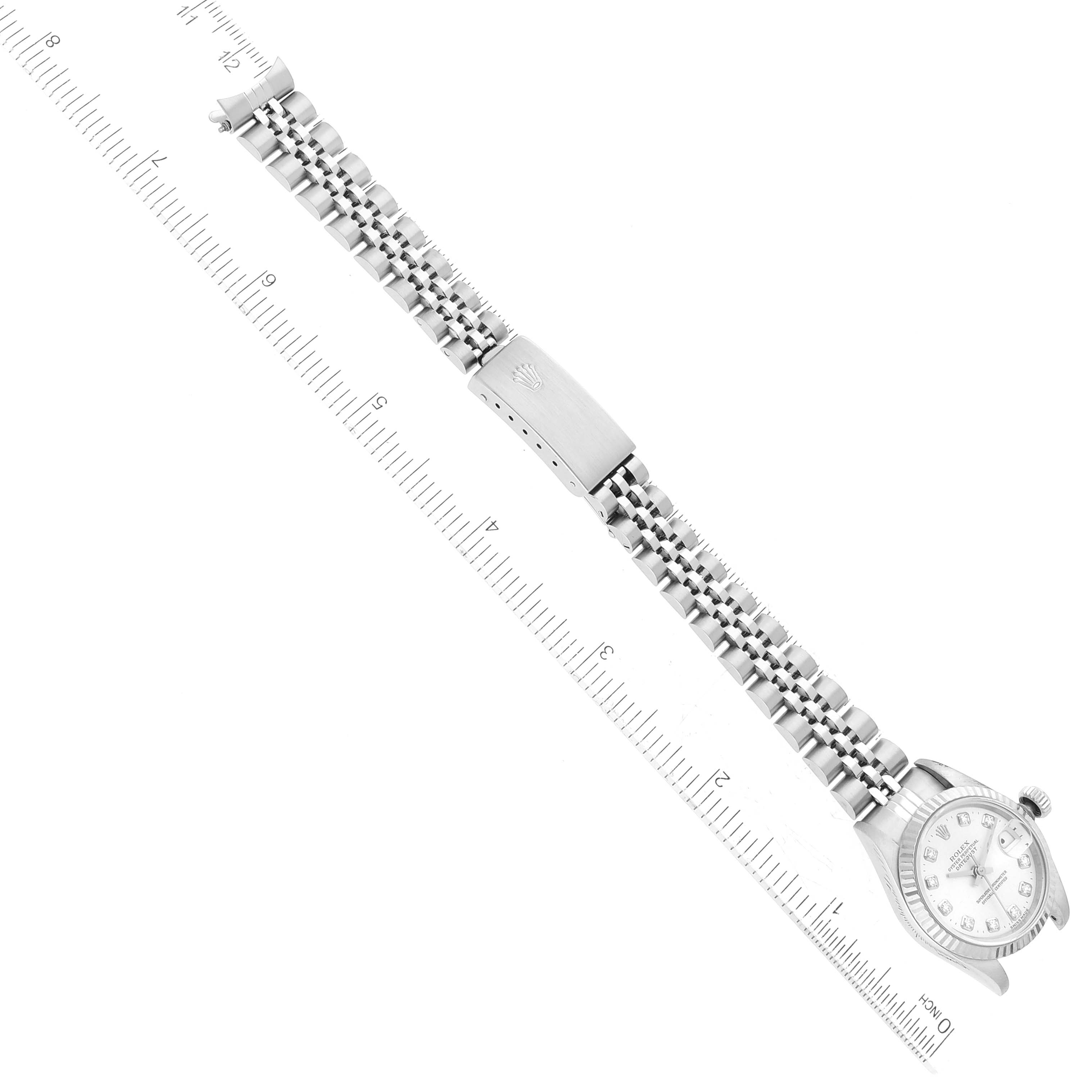 The image shows a Rolex Datejust 69174 Women's Stainless Steel Silver Dial 69174 Women's Stainless Steel Silver Dial watch, displaying the bracelet, clasp, and part of the watch case with a ruler for scale.