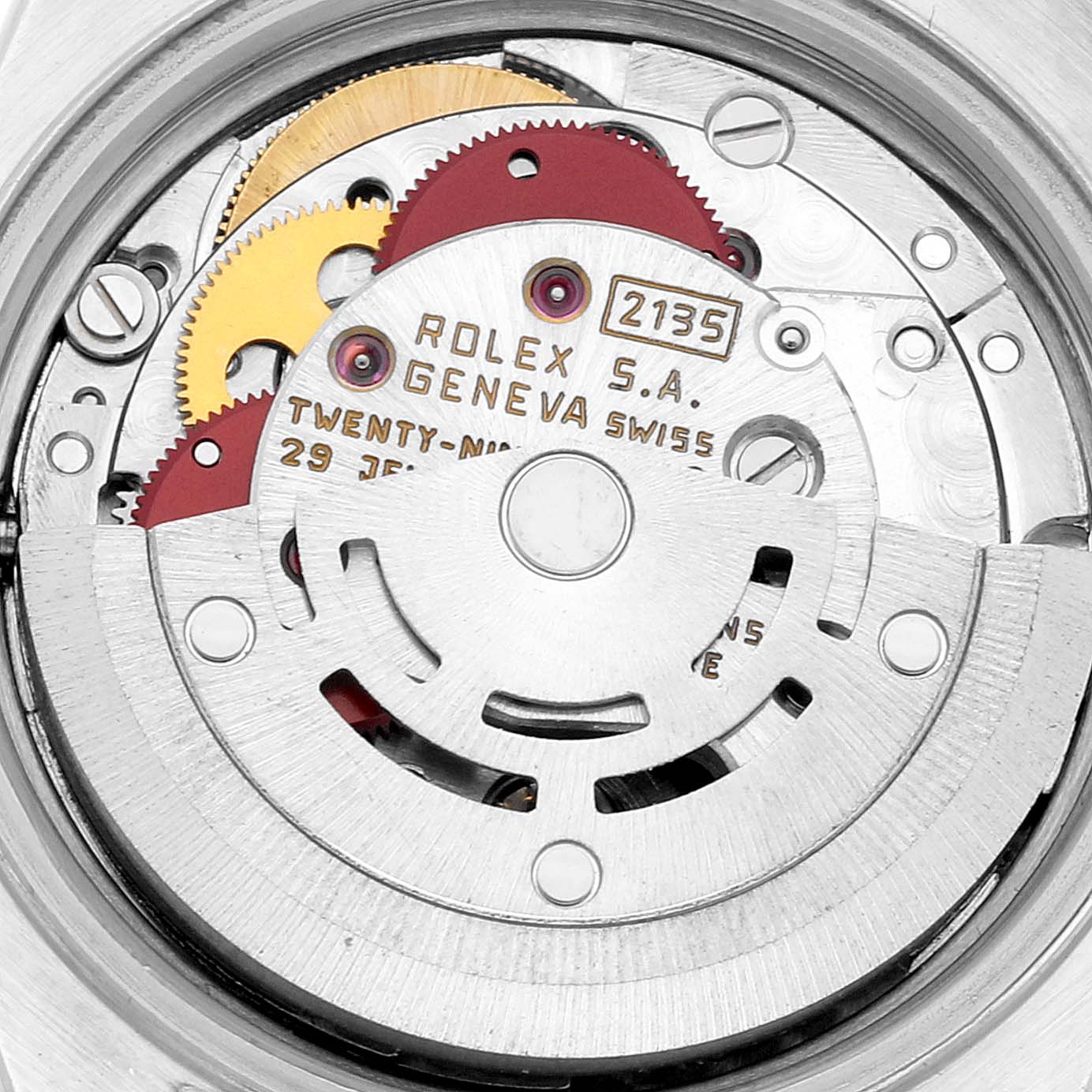 This image shows the internal mechanism of a Rolex Datejust 69174 Women's Stainless Steel Grey Dial 69174 Women's Stainless Steel Grey Dial watch, specifically the movement with gears and inscriptions.