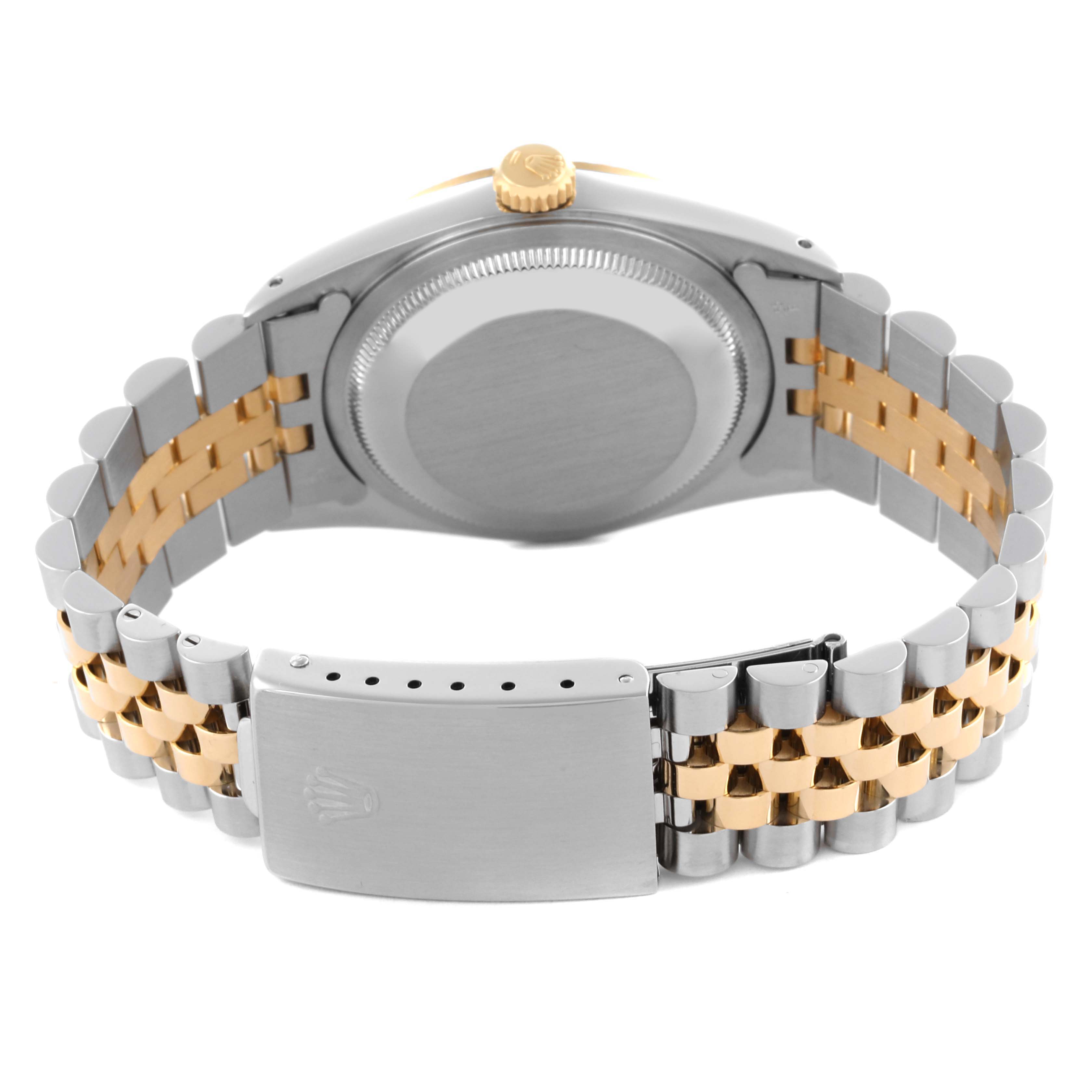 The image shows the back view of a Rolex Datejust 16233 Men's Steel and Gold (two tone) Blue Dial 16233 Men's Steel and Gold (two tone) Blue Dial, highlighting the case back and two-tone bracelet.