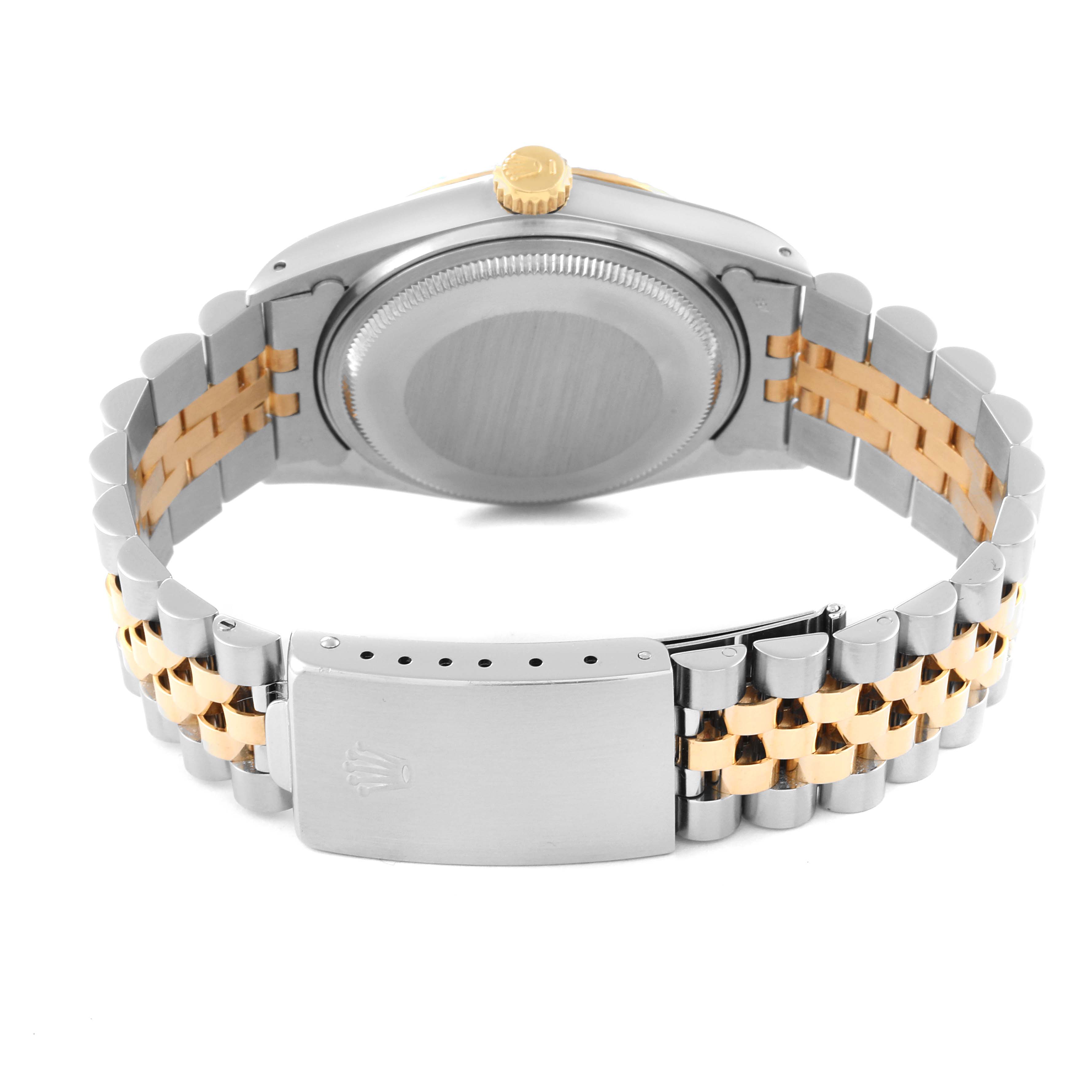 The image shows the back view of a Rolex Vintage Collection 16013 Men's Steel and Gold (two tone) Burgundy Dial 16013 Men's Steel and Gold (two tone) Burgundy Dial watch, highlighting its clasp, bracelet, and case back.