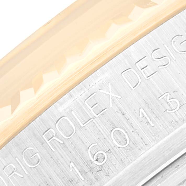 This close-up image shows the engraved model number and design details on the side of a Rolex Vintage Collection 16013 Men's Steel and Gold (two tone) Burgundy Dial 16013 Men's Steel and Gold (two tone) Burgundy Dial watch case.