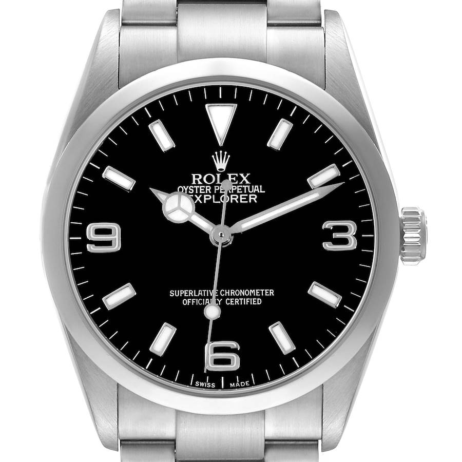 The Rolex Explorer watch is shown from the front, featuring the black dial, silver bezel, and part of the bracelet.