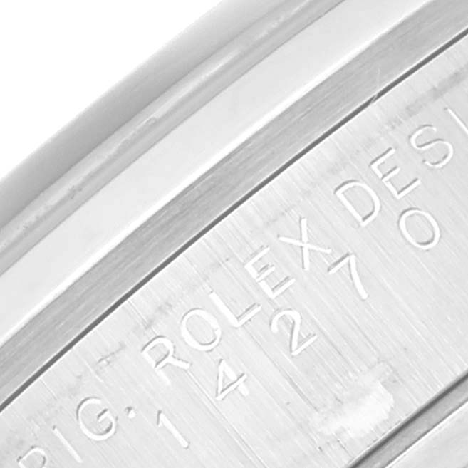 The image shows a close-up of the side engraving on the Rolex Explorer 14270 Men
s Stainless Steel Black Dial 14270 Men
s Stainless Steel Black Dial model watch.