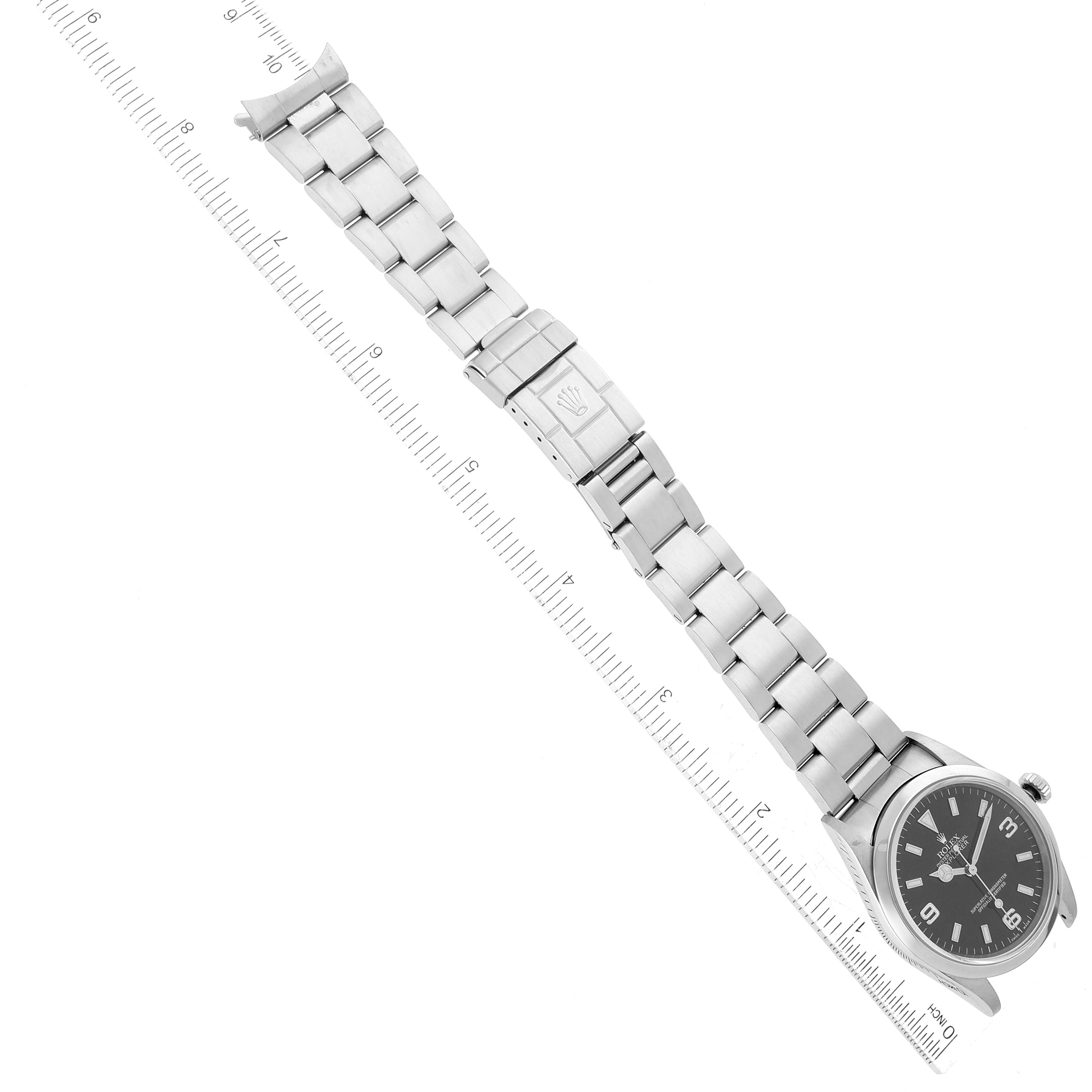 The image shows a top-down view of a Rolex Explorer 14270 Men
s Stainless Steel Black Dial 14270 Men
s Stainless Steel Black Dial model watch, including the face, bezel, bracelet, and clasp.