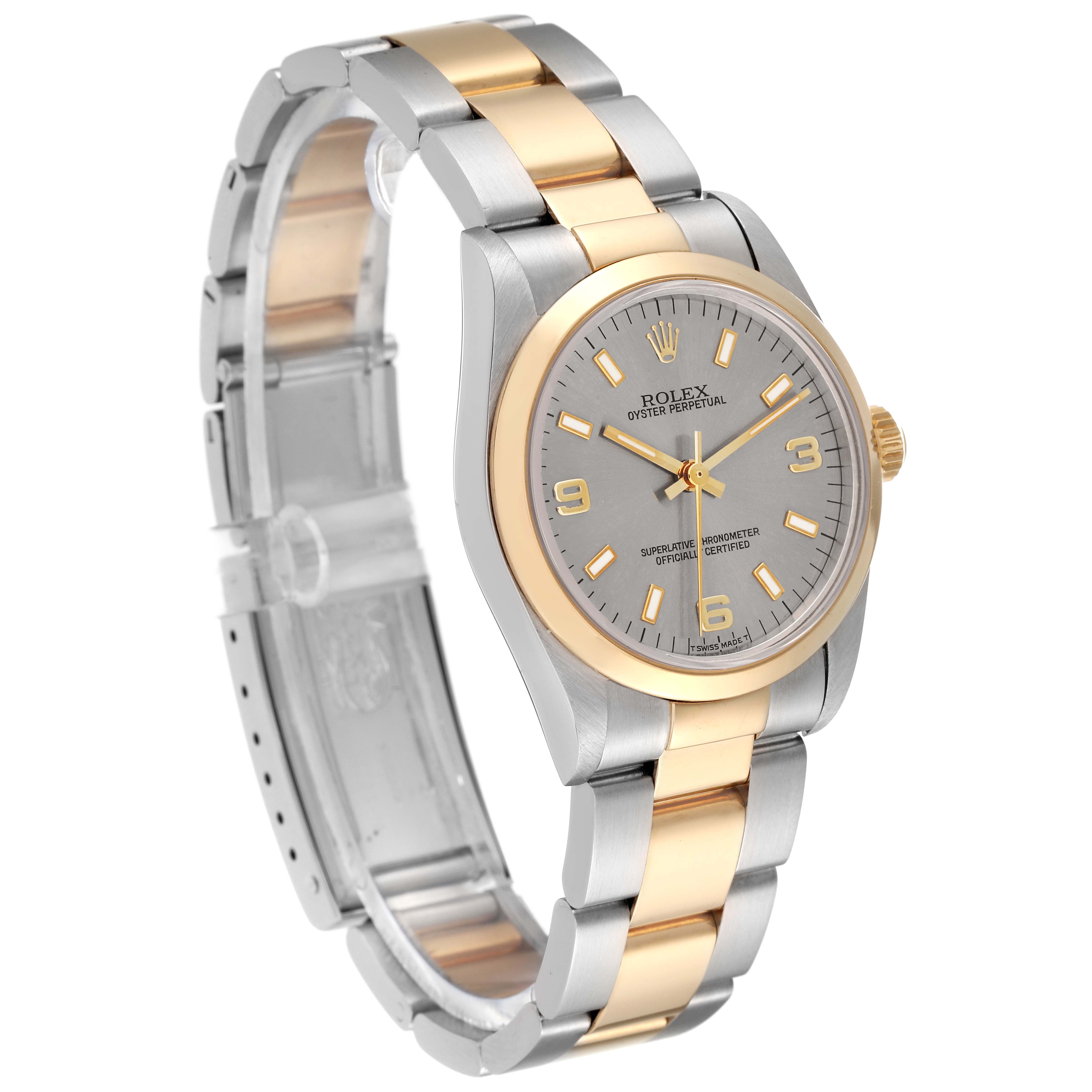 This image shows a side angle of the Rolex Mid-Size 67483 Women's Steel and Gold (two tone) Grey Dial 67483 Women's Steel and Gold (two tone) Grey Dial Oyster Perpetual watch, highlighting the gray dial, gold bezel, and two-tone bracelet.