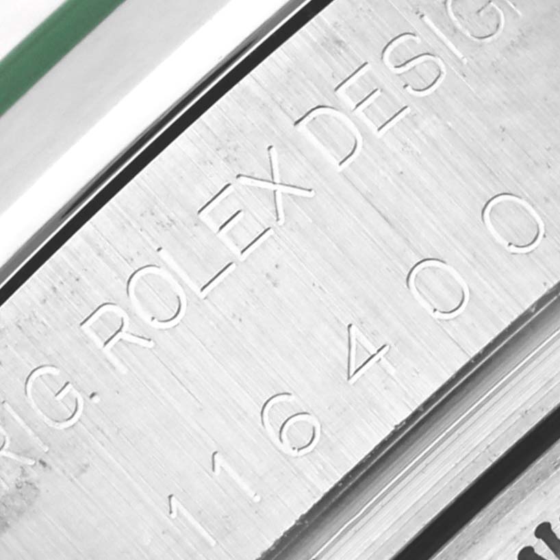 The image shows a close-up of the engraved side of the Milgauss model by Rolex.