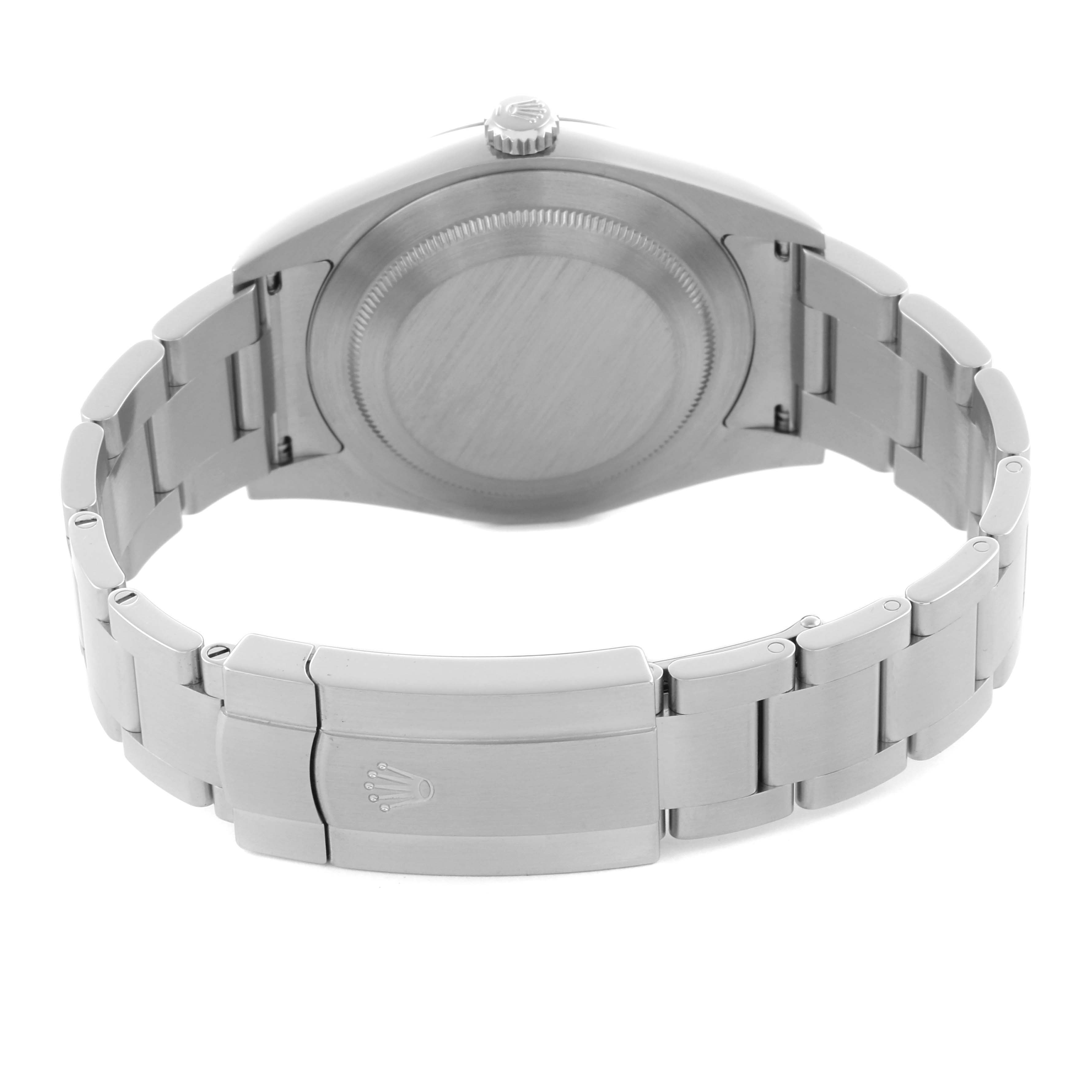 The image shows the backside of a Rolex Oyster Perpetual 114300 Men's Stainless Steel Silver Dial 114300 Men's Stainless Steel Silver Dial, highlighting the case back and bracelet clasp.