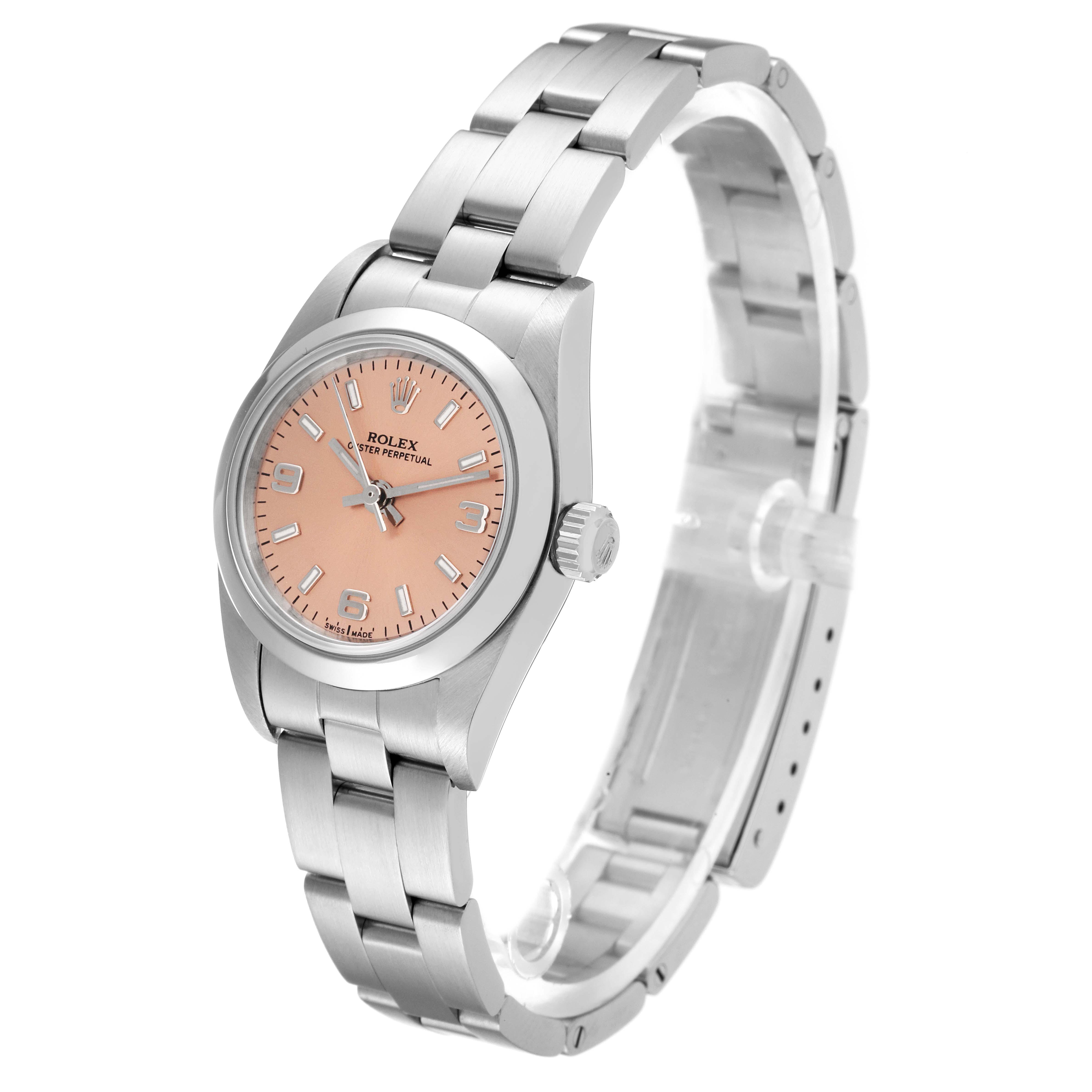 The image shows a side and angled view of a Rolex Oyster Perpetual 76080 Women
s Stainless Steel Pink Dial 76080 Women
s Stainless Steel Pink Dial watch, highlighting its pink dial and stainless steel bracelet.