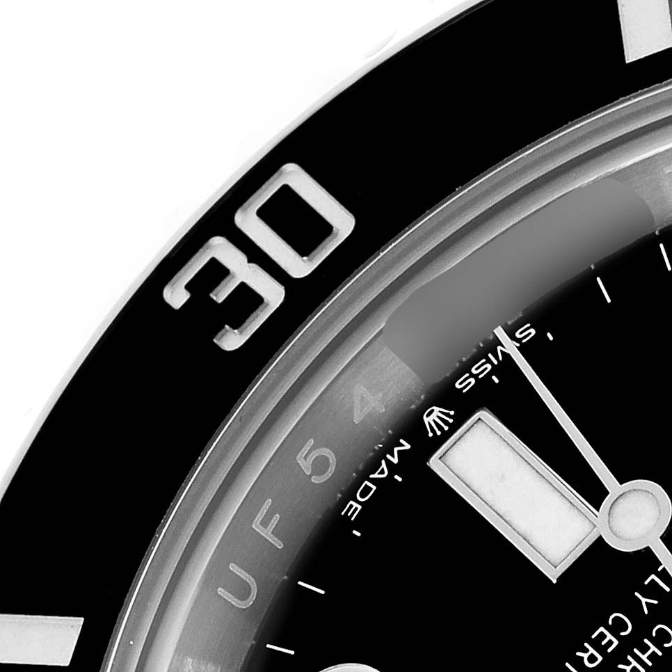 The image shows a close-up of the bezel and part of the dial of a Rolex Submariner 126610LN Men
s Stainless Steel Black Dial 126610LN Men
s Stainless Steel Black Dial watch, highlighting the "30" marker.