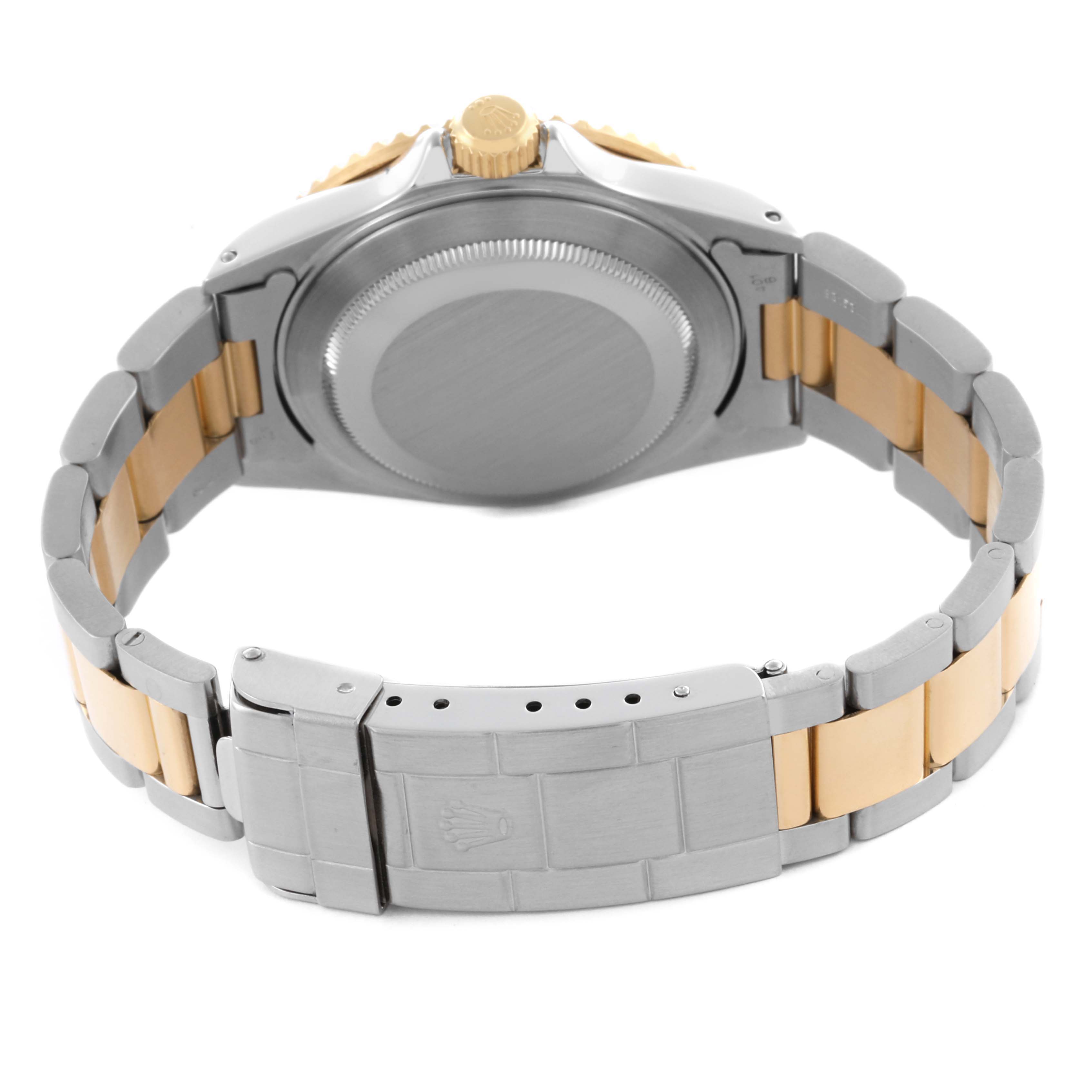 The image shows the back case and metal bracelet of a Rolex Submariner 16613 Men's Steel and Gold (two tone) Blue Dial 16613 Men's Steel and Gold (two tone) Blue Dial, viewed from an angled rear perspective.