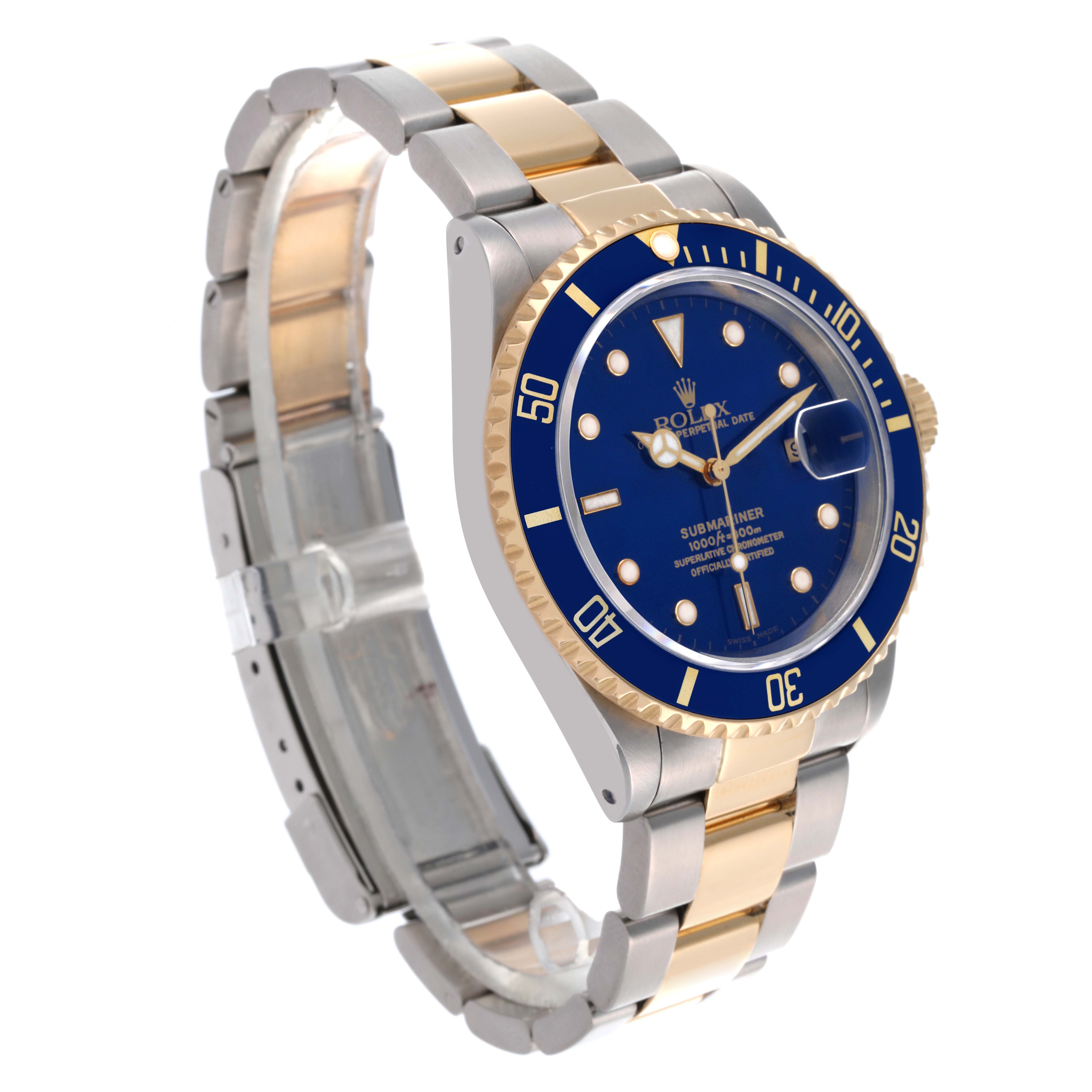 The Rolex Submariner 16613 Men's Steel and Gold (two tone) Blue Dial 16613 Men's Steel and Gold (two tone) Blue Dial watch is shown at a three-quarter angle, highlighting its face, bezel, and band.