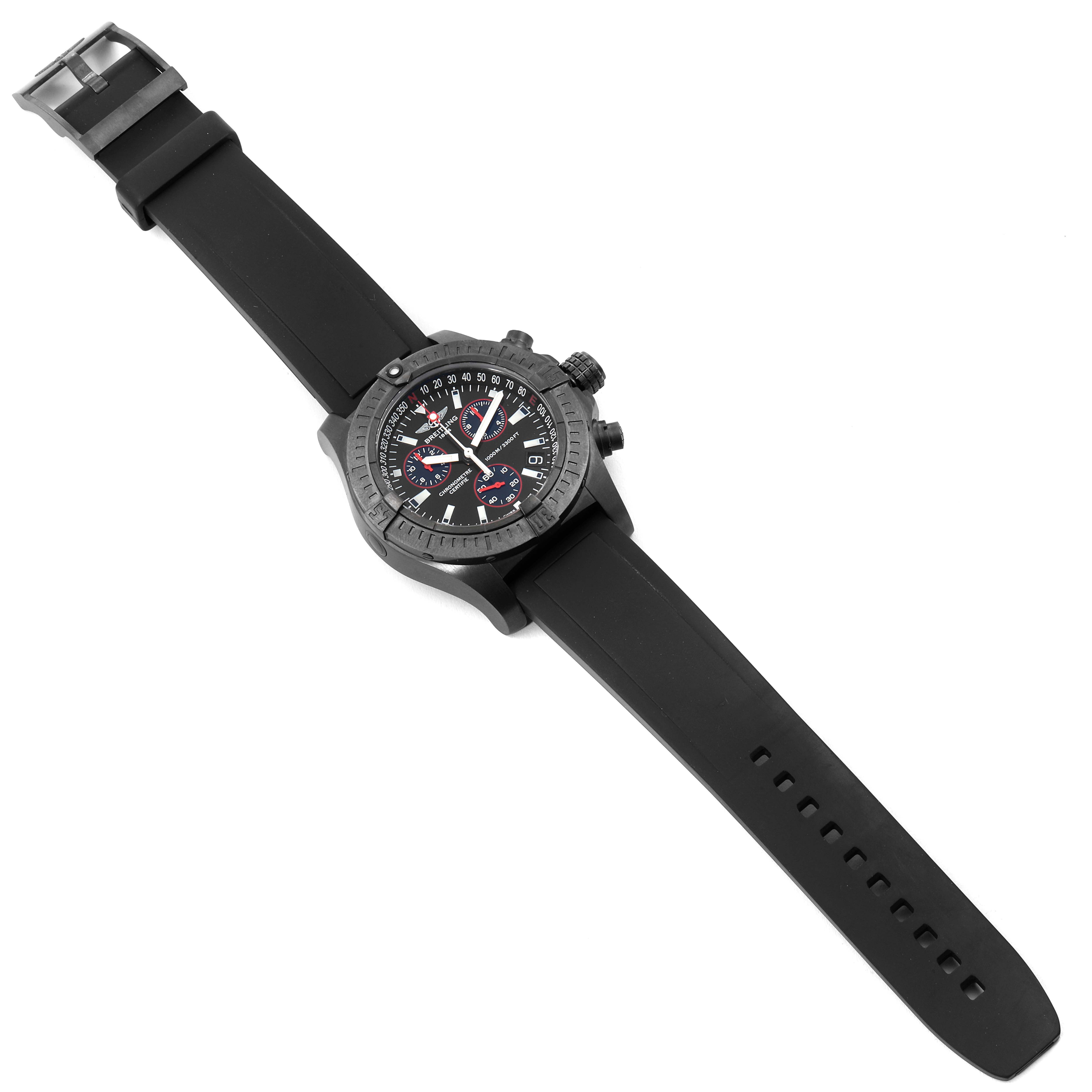 The Breitling Avenger M73390 Men's Stainless Steel Black Dial M73390 Men's Stainless Steel Black Dial watch is shown in a top-down angle, displaying the face, bezel, and entire rubber strap.