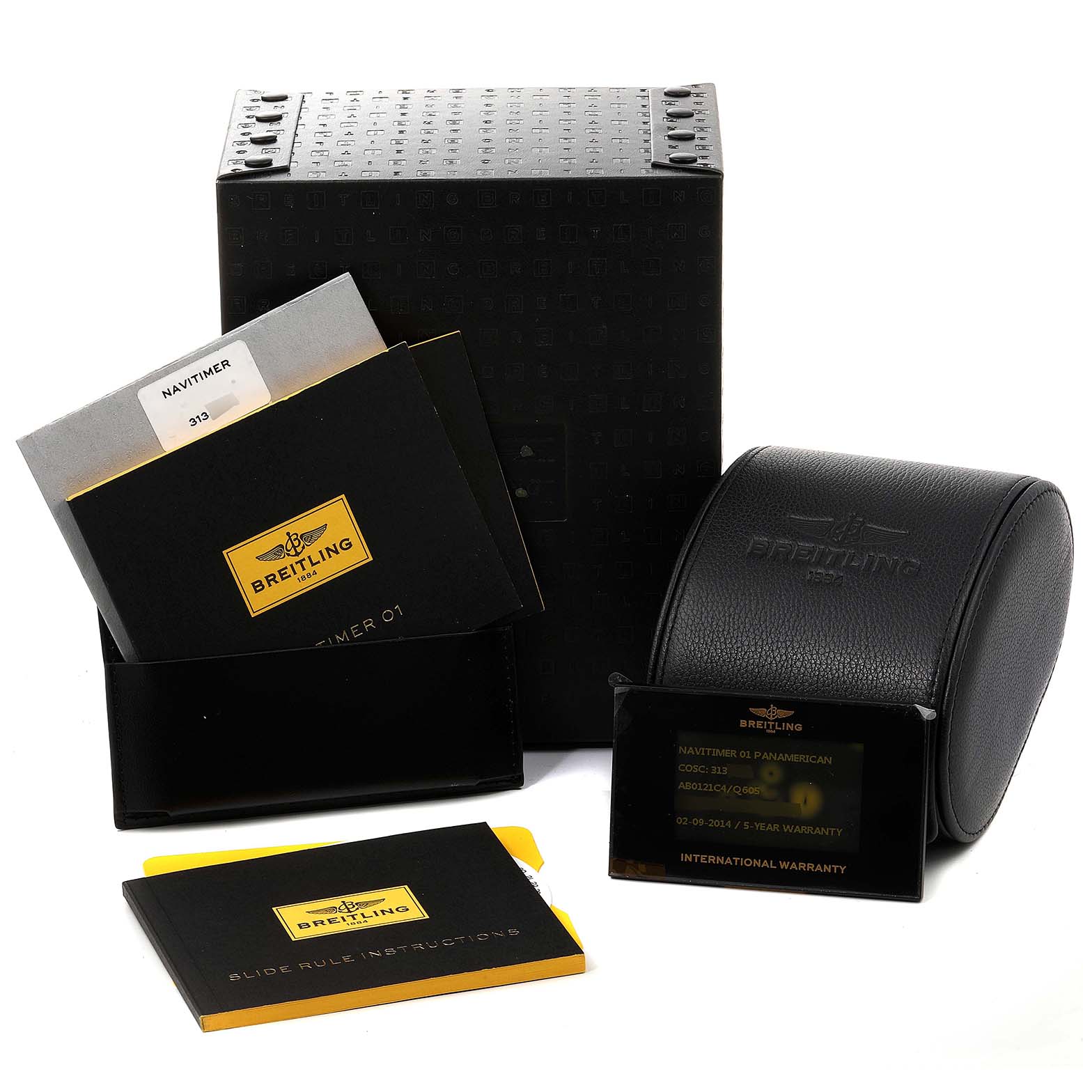 The image shows a Breitling Navitimer AB0121C4-Q605-739P-A20BA.1 Men's Stainless Steel Brown Dial AB0121C4-Q605-739P-A20BA.1 Men's Stainless Steel Brown Dial watch box, instruction booklets, and warranty card at a slight angle.