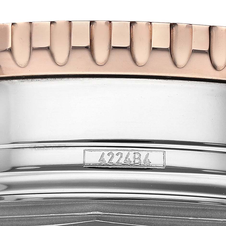 This image shows a close-up of the watch's side, focusing on the bezel and edge details of the Breitling Navitimer U13324 Men's Stainless Steel Black Dial.