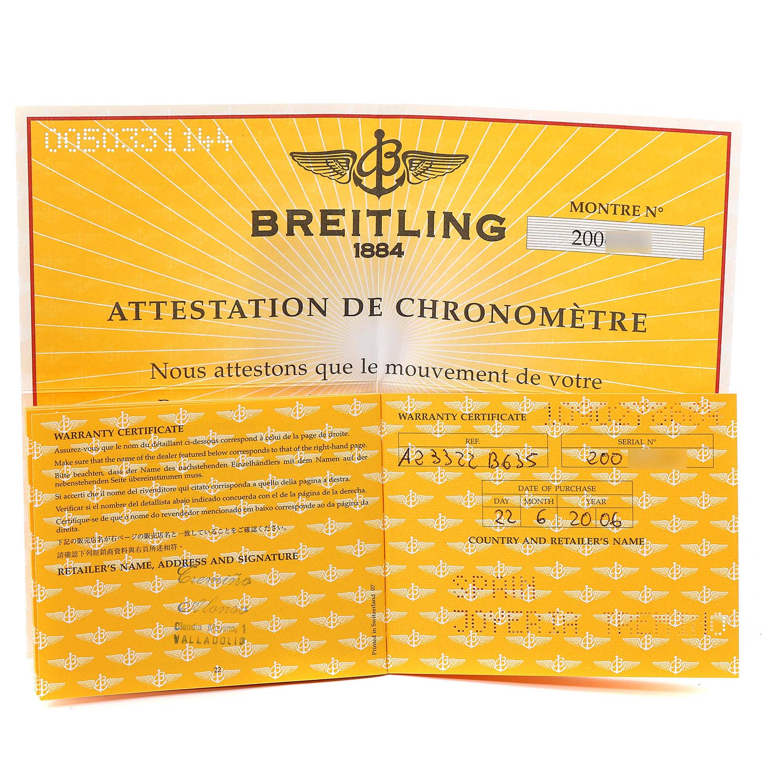 The image shows the warranty certificate and chronometer certification papers for a Breitling Navitimer A23322 Men's Stainless Steel Black Dial A23322 Men's Stainless Steel Black Dial watch.