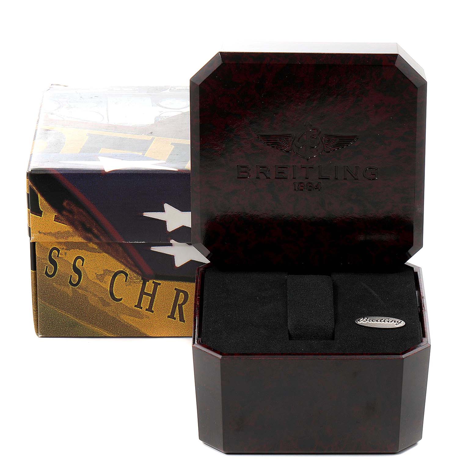 This image shows an open Breitling Navitimer A13022 Men
s Stainless Steel Silver Dial A13022 Men
s Stainless Steel Silver Dial watch box with its lid raised and an outer packaging box in the background.